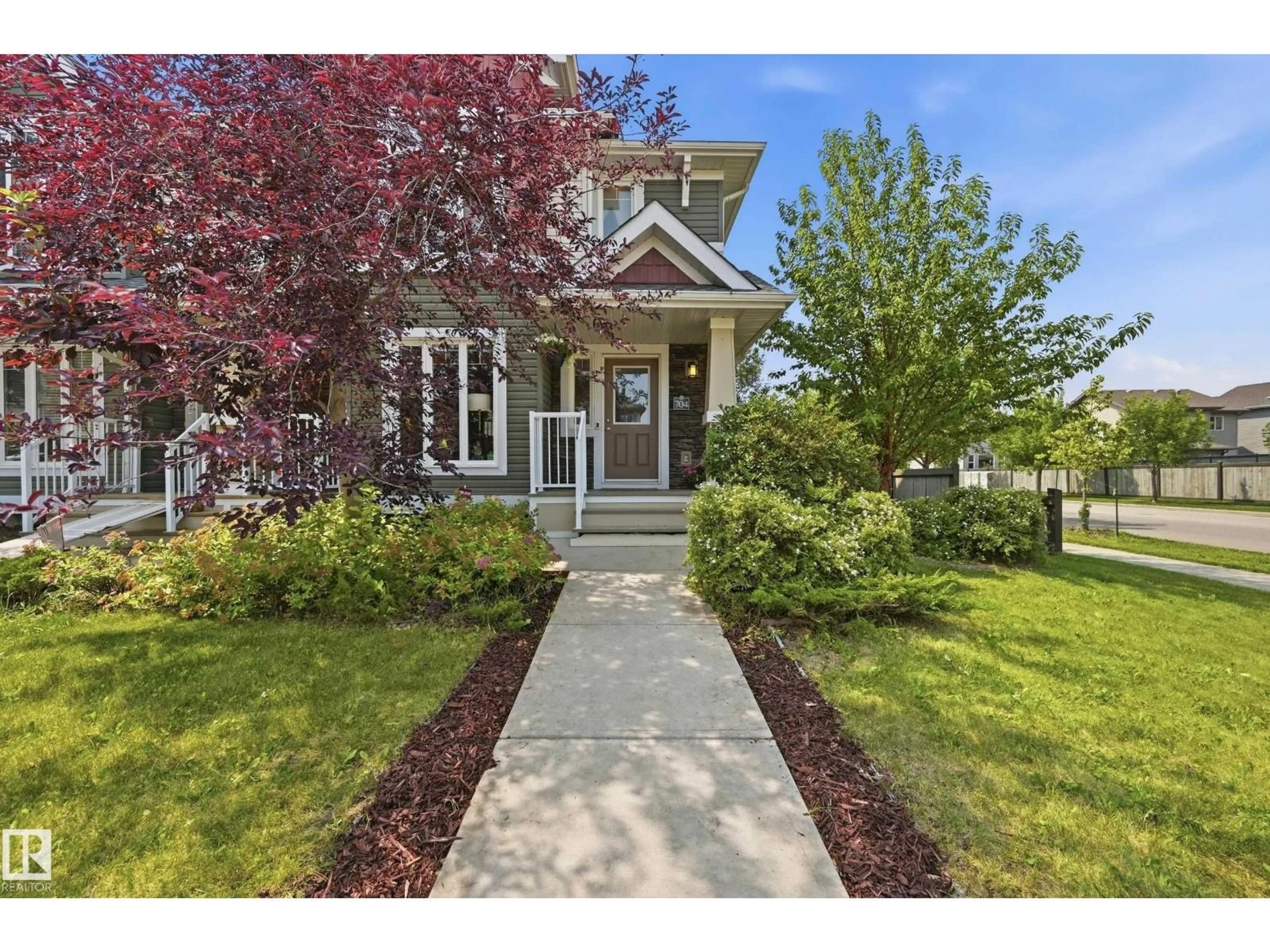 Home with vinyl exterior material, street for SW SW - 704 176 ST, Edmonton Alberta T6W2G7