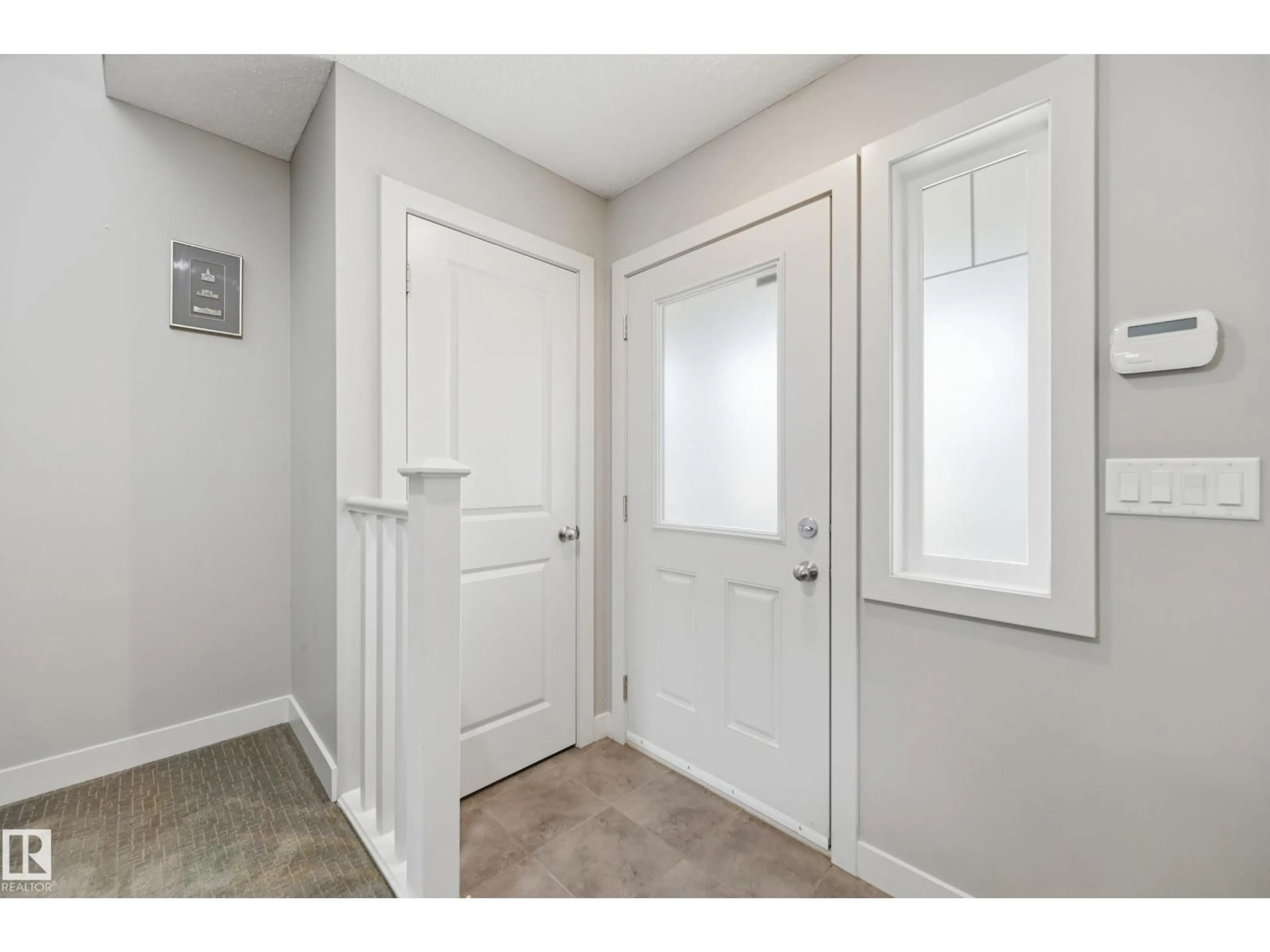 Indoor entryway for SW SW - 704 176 ST, Edmonton Alberta T6W2G7