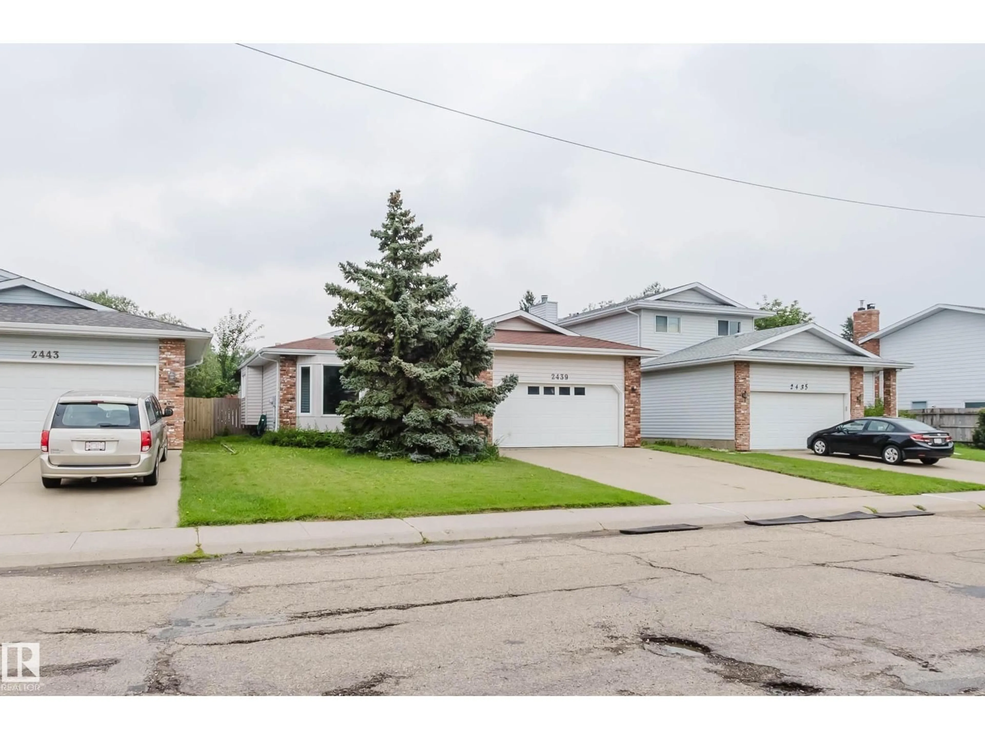A pic from outside/outdoor area/front of a property/back of a property/a pic from drone, street for NW - 2439 112 ST, Edmonton Alberta T6J4N7