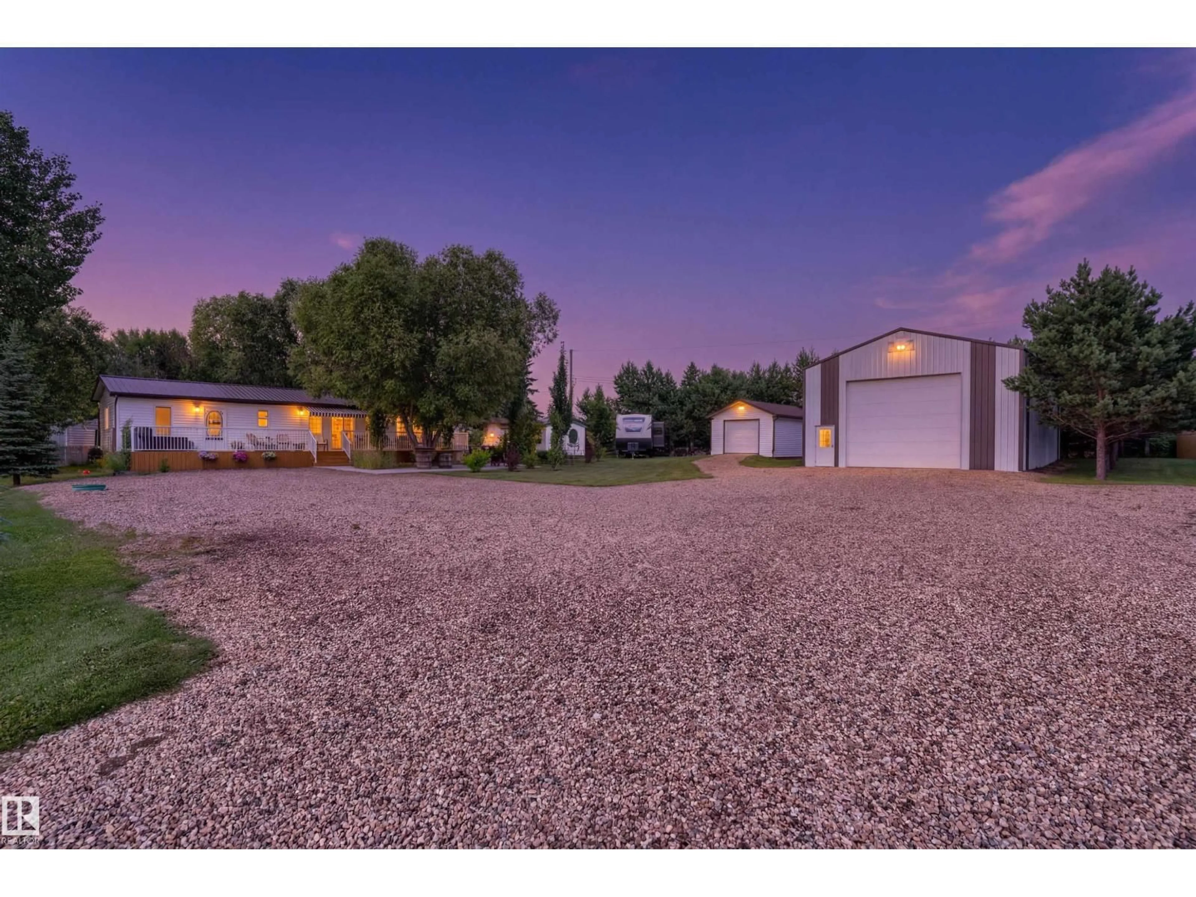A pic from outside/outdoor area/front of a property/back of a property/a pic from drone, street for 816 BAPTISTE DRIVE, Rural Athabasca County Alberta T9S1R8