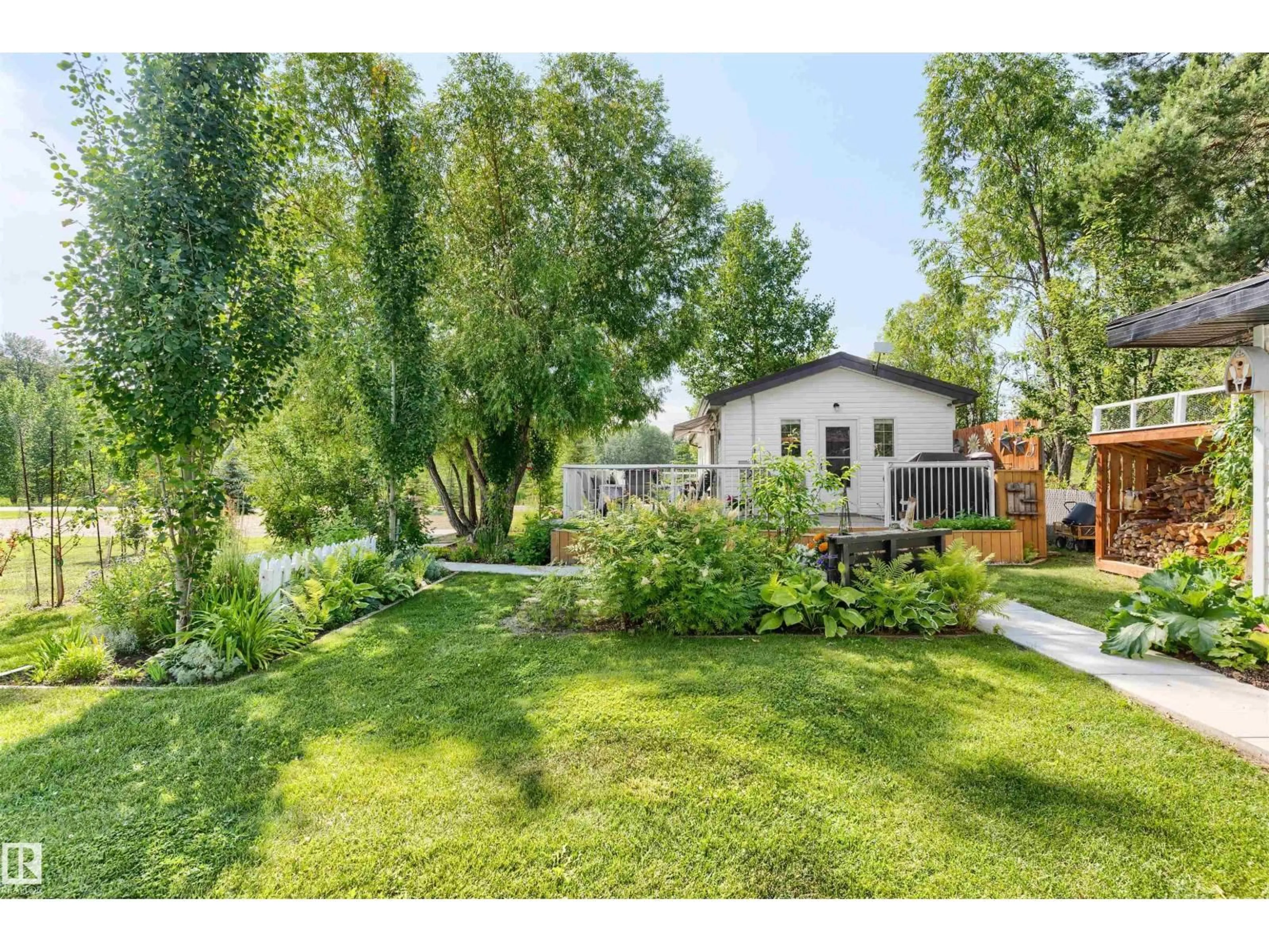 A pic from outside/outdoor area/front of a property/back of a property/a pic from drone, street for 816 BAPTISTE DRIVE, Rural Athabasca County Alberta T9S1R8