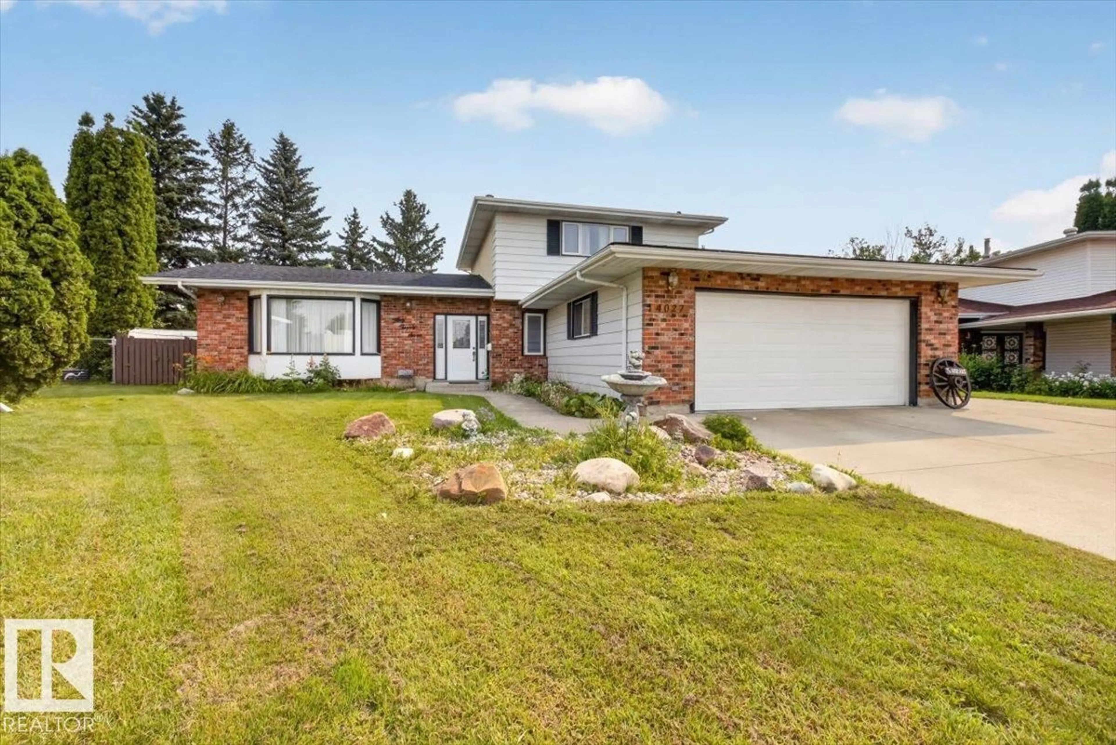 Home with brick exterior material, street for 4027 74 ST, Edmonton Alberta T6K0W7
