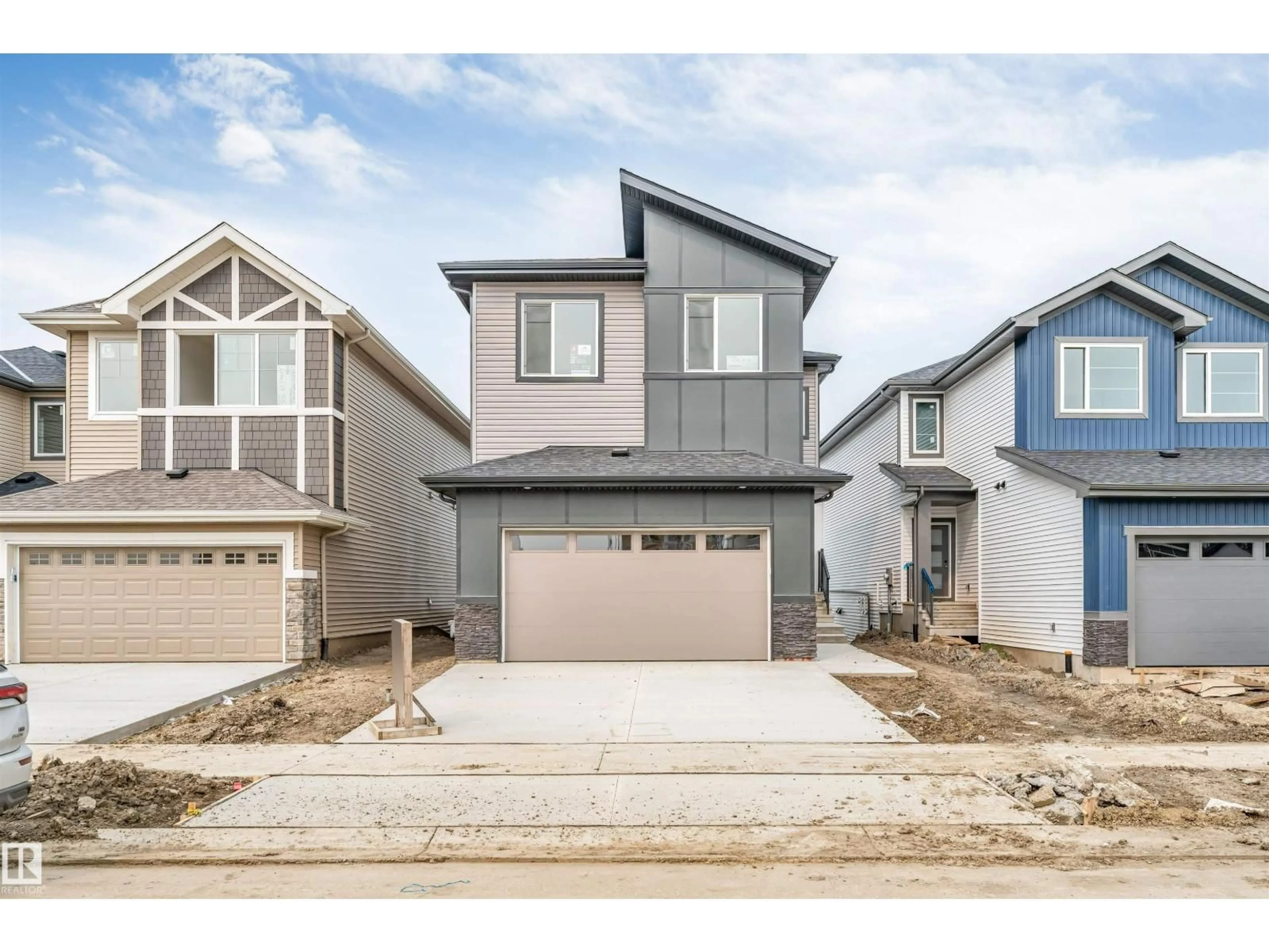 Home with vinyl exterior material, street for 4234 63 ST, Beaumont Alberta T4X3E9