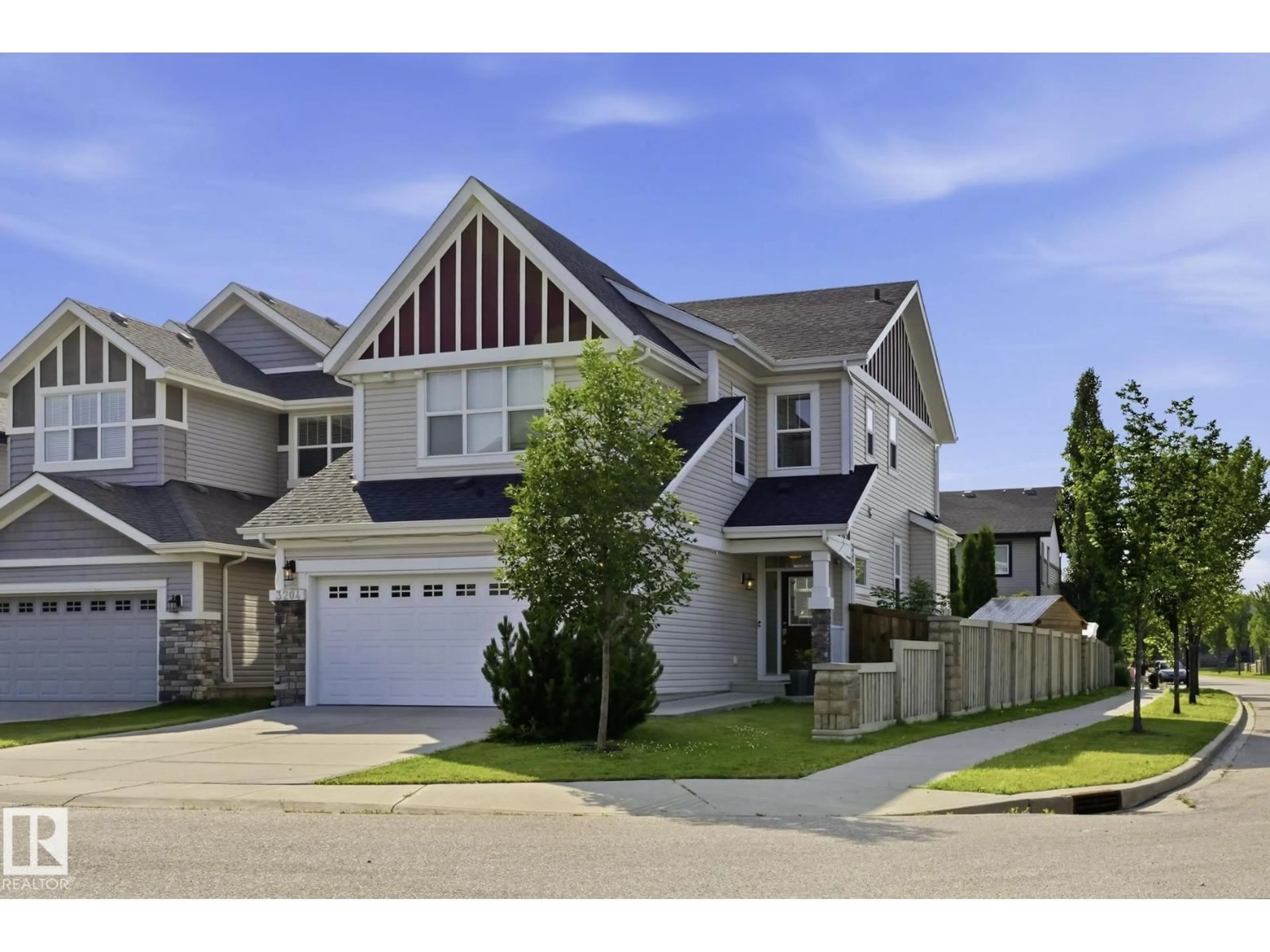 Home with vinyl exterior material, street for SW SW - 3204 ABBOTT CR, Edmonton Alberta T6W2V3