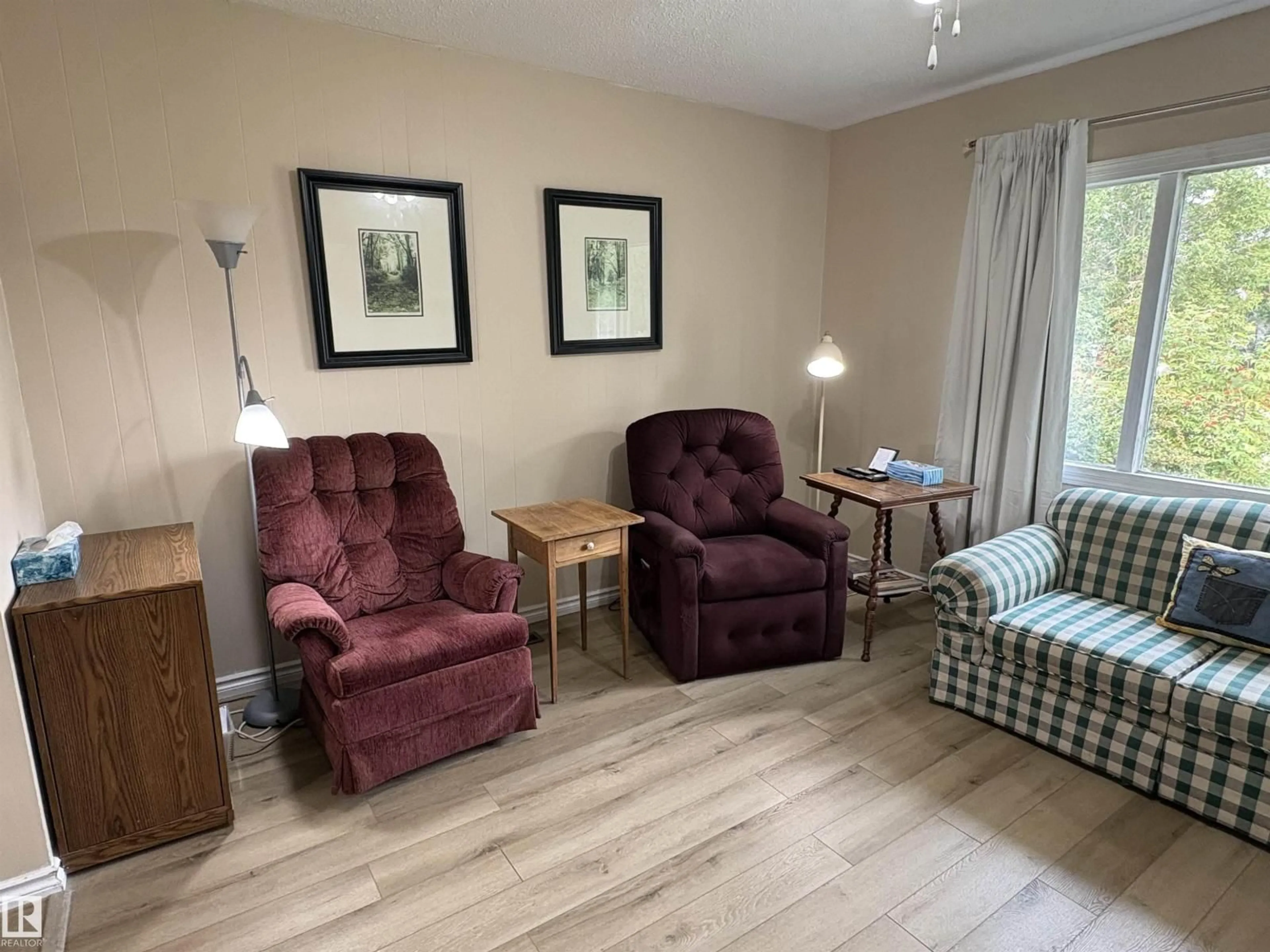 Living room with furniture, wood/laminate floor for 5308 50 ST, Ryley Alberta T0B4A0
