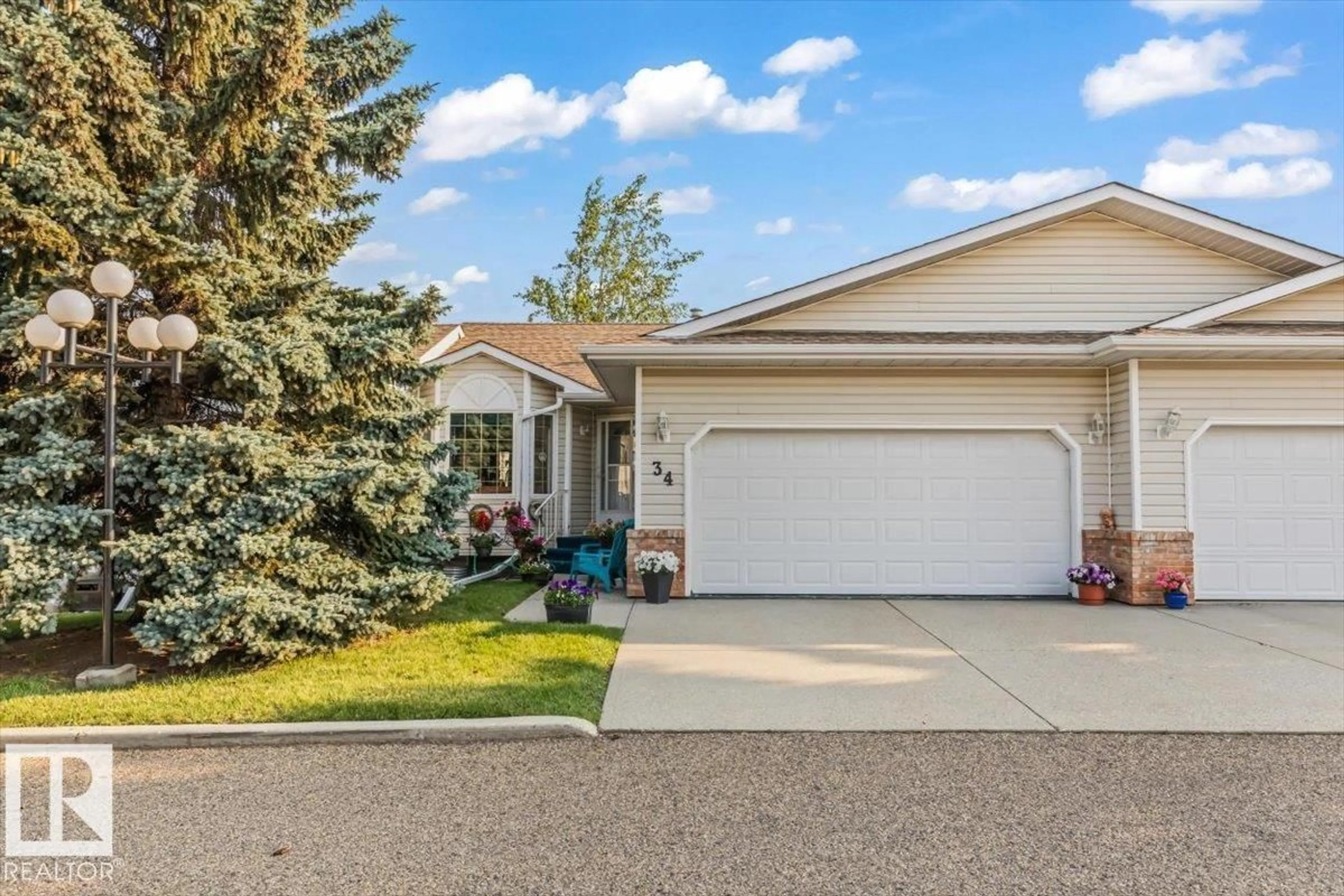Home with vinyl exterior material, street for 7 - 34 CRANFORD WY, Sherwood Park Alberta T8H5W5