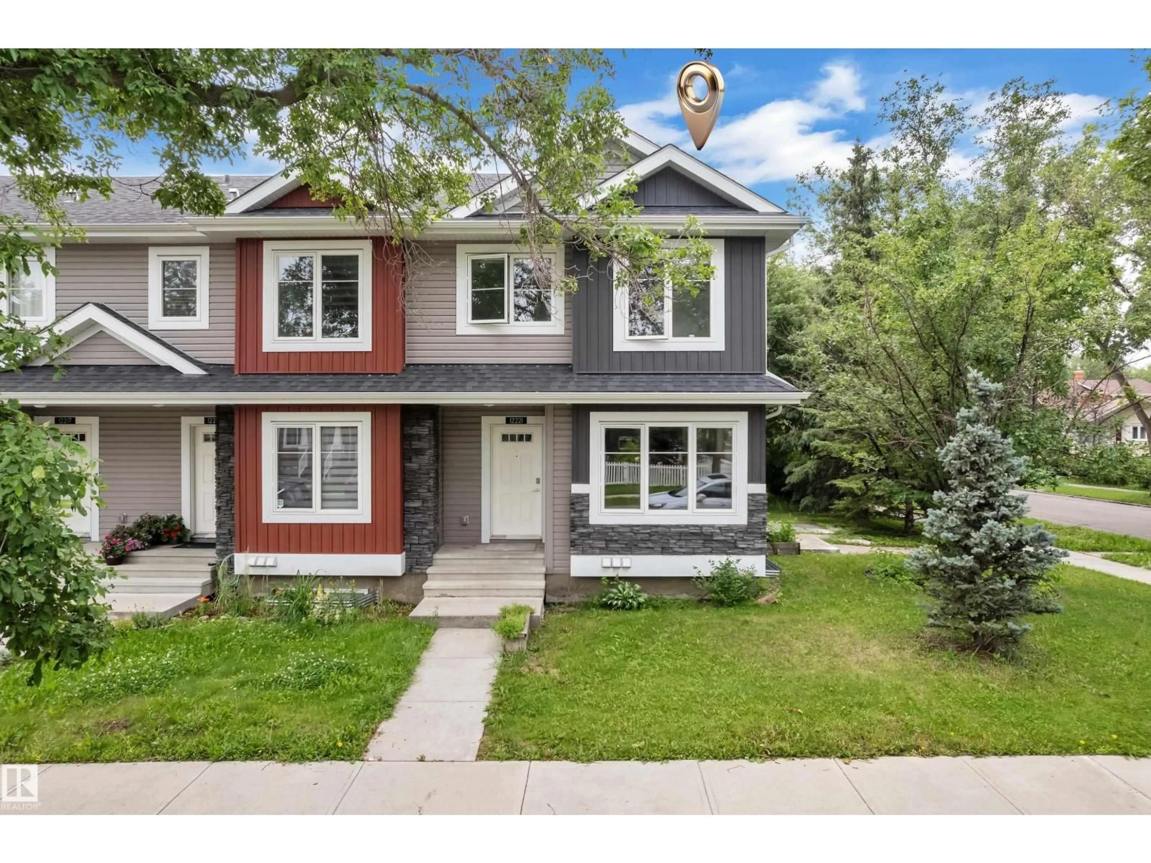 Home with vinyl exterior material, street for NW - 12221 117 AV, Edmonton Alberta T5M0G8