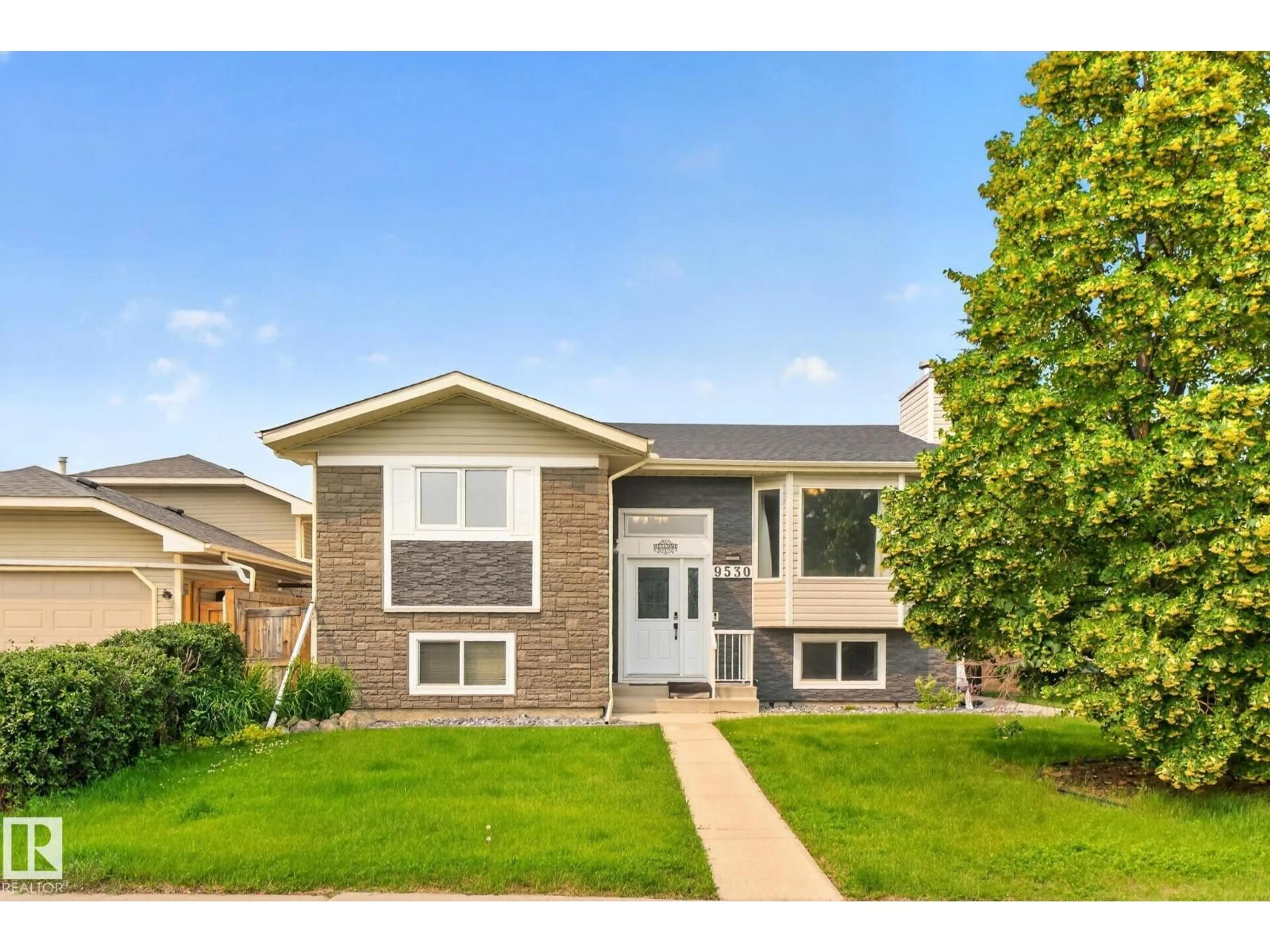 Home with brick exterior material, street for 9530 174 AV, Edmonton Alberta T5Z2B3