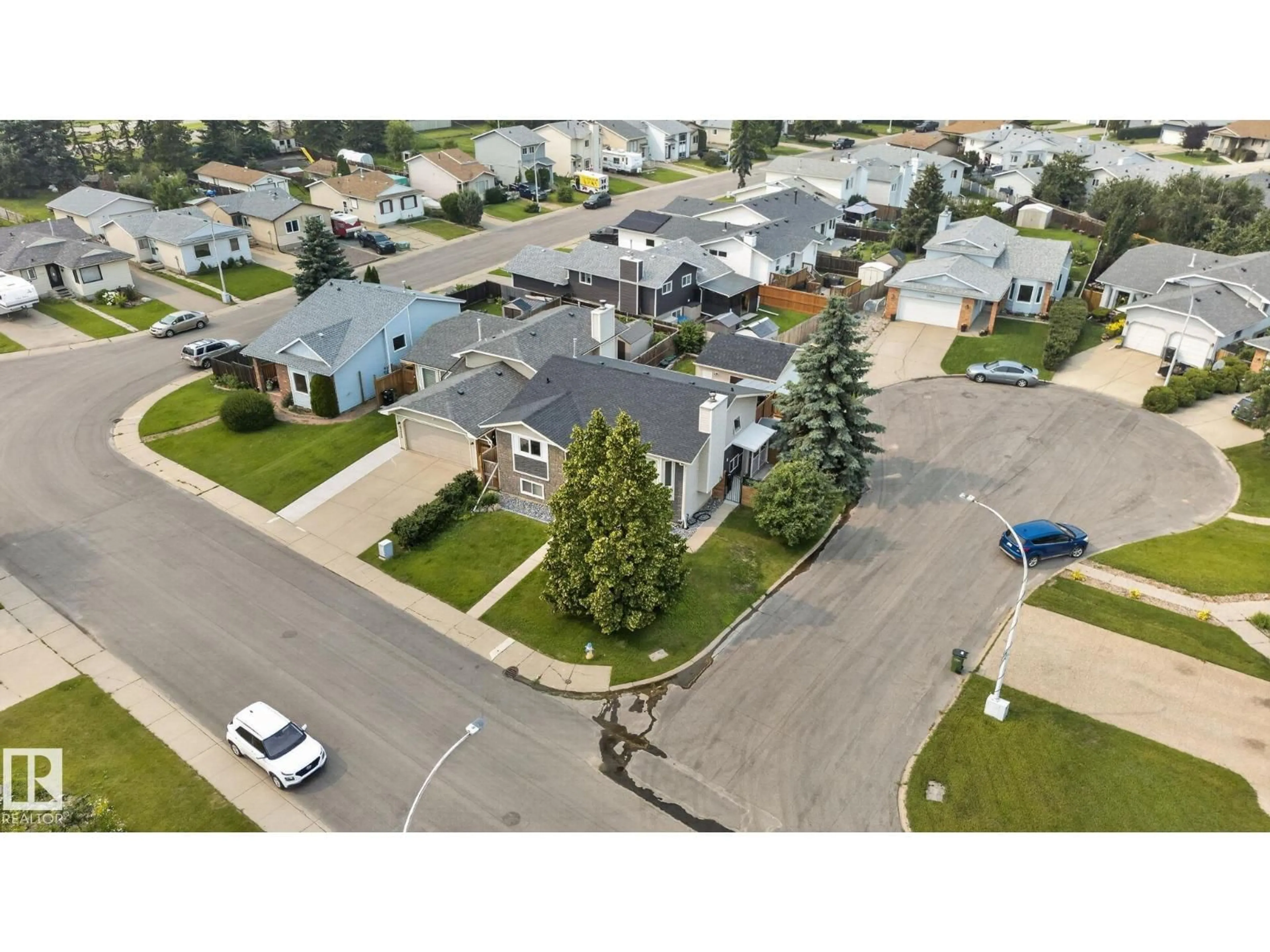 A pic from outside/outdoor area/front of a property/back of a property/a pic from drone, street for 9530 174 AV, Edmonton Alberta T5Z2B3