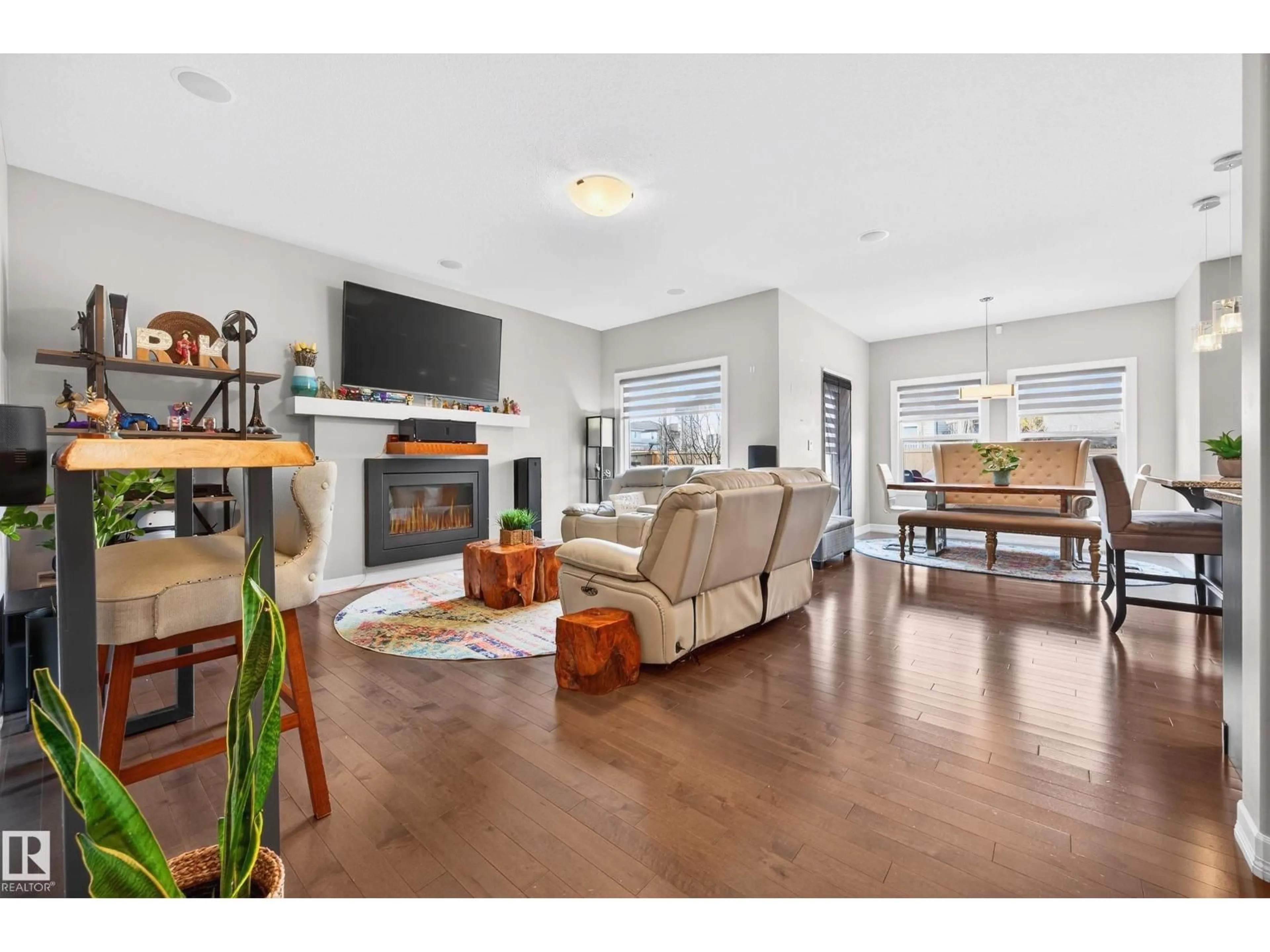 Living room with furniture, wood/laminate floor for 3306 HILTON CR, Edmonton Alberta T6M0N4