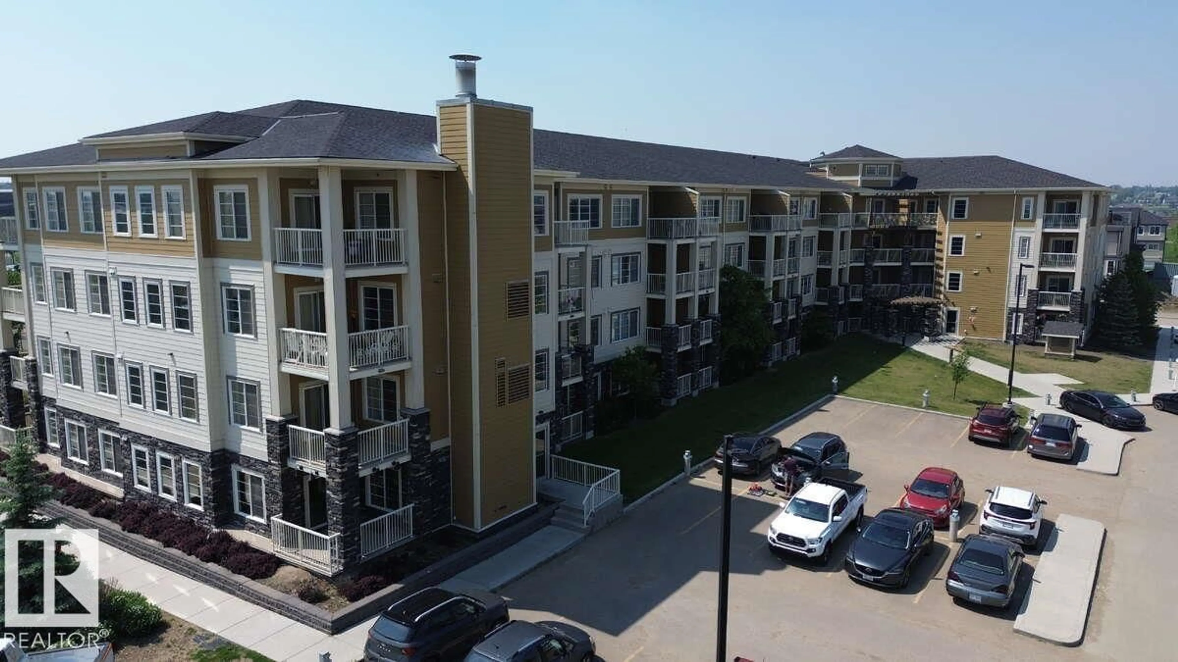 A pic from outside/outdoor area/front of a property/back of a property/a pic from drone, unknown for #302 - 3670 139 AV, Edmonton Alberta T5Y3N5
