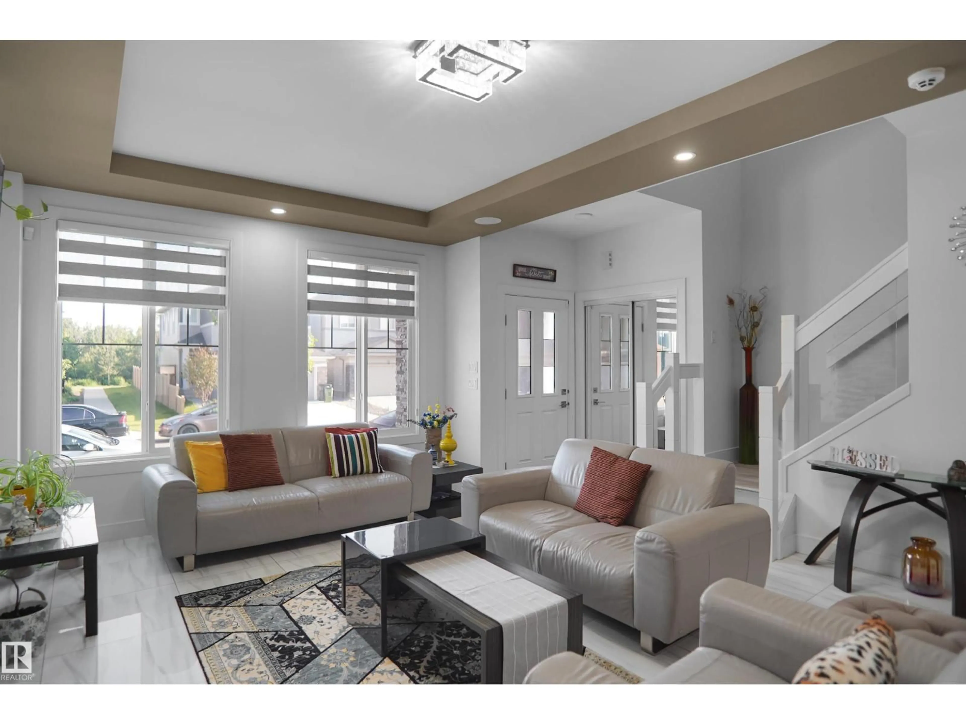 Living room with furniture, unknown for NW - 6532 175 AV, Edmonton Alberta T5Y4B3