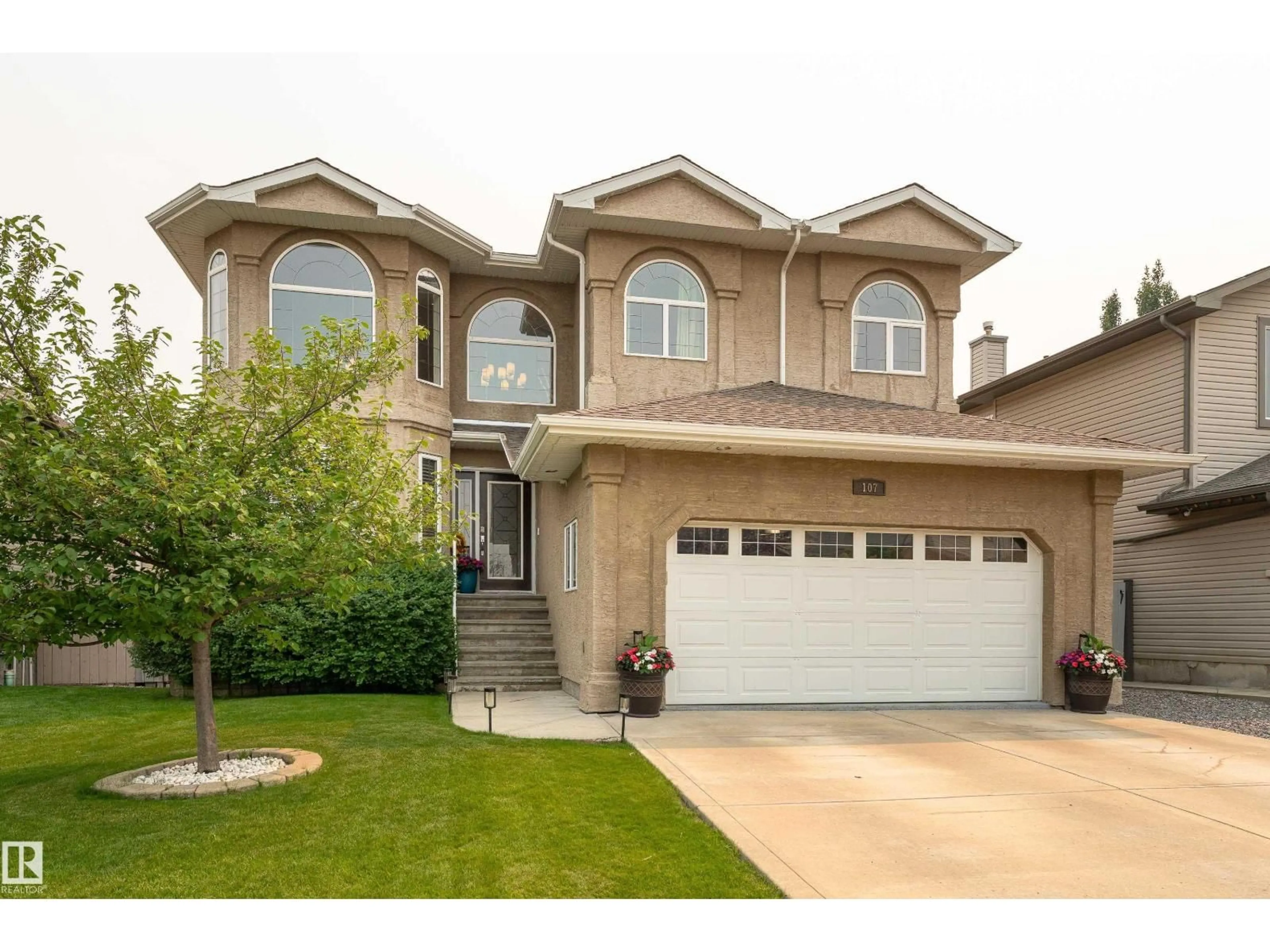 Home with vinyl exterior material, street for 107 MCDOWELL WD, Leduc Alberta T9E0J6