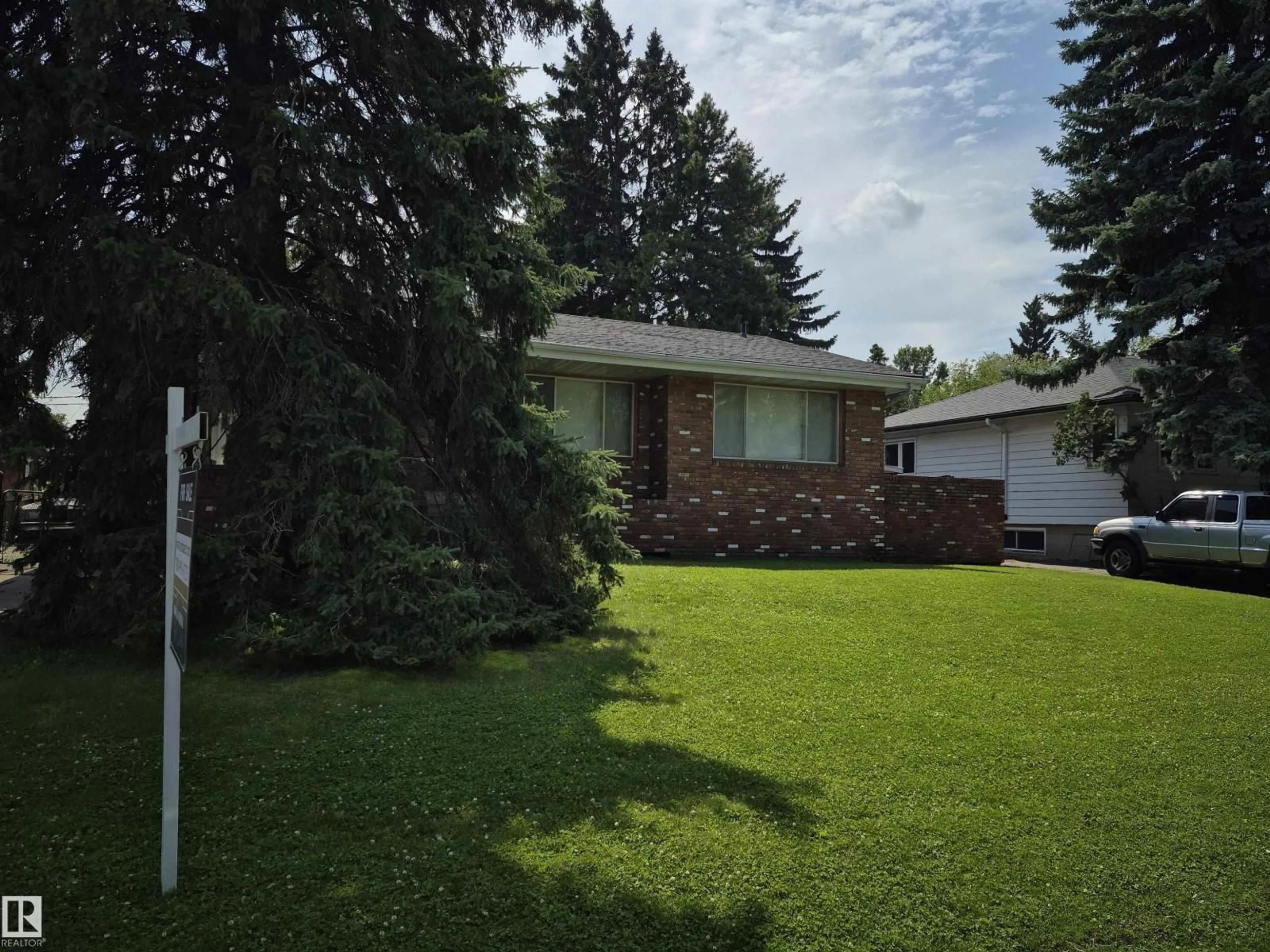 A pic from outside/outdoor area/front of a property/back of a property/a pic from drone, unknown for 11715 83 AV, Edmonton Alberta T6G0V2