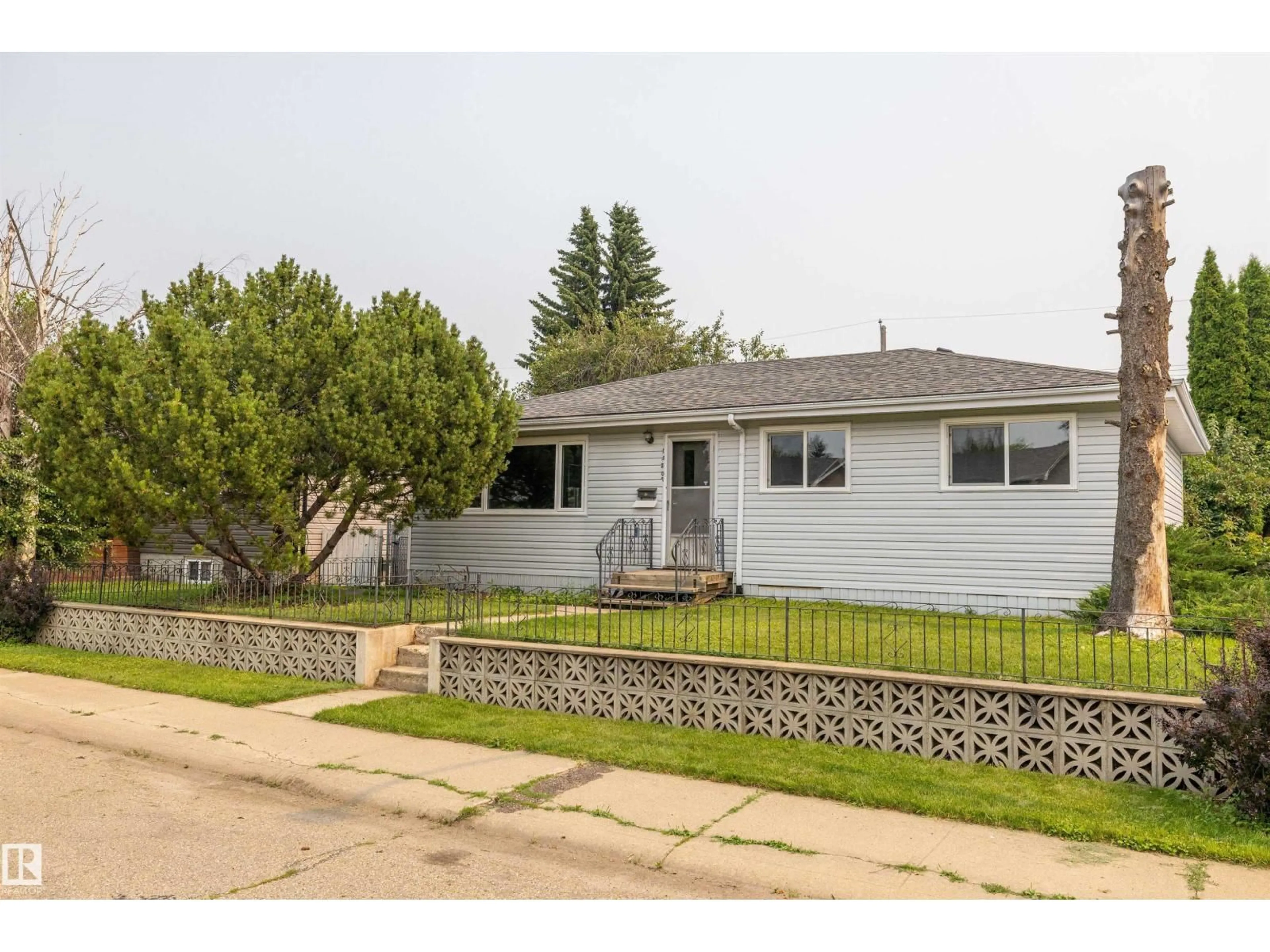Home with vinyl exterior material, street for NW - 13207 77 ST, Edmonton Alberta T5C1C8