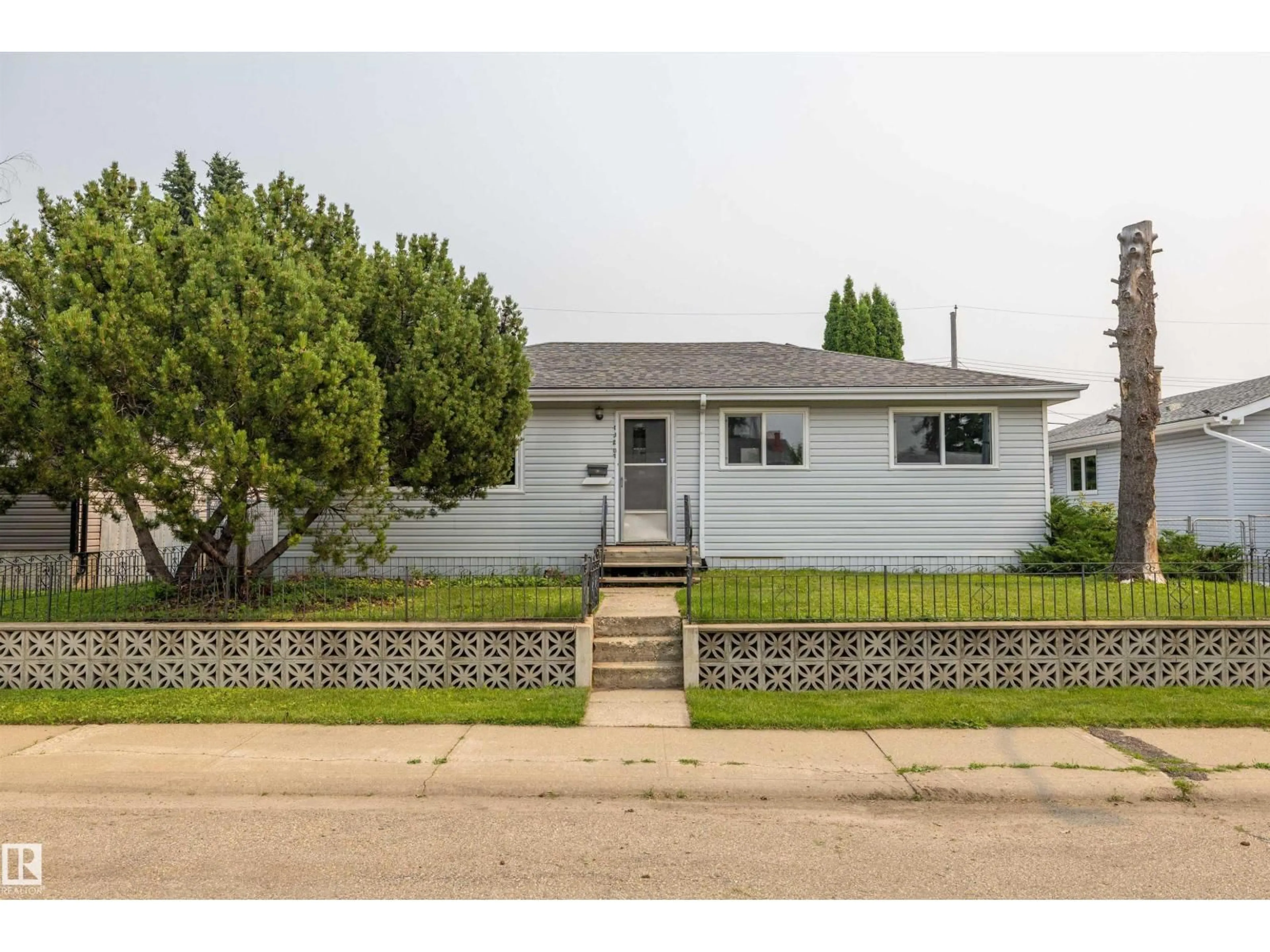 Home with vinyl exterior material, street for NW - 13207 77 ST, Edmonton Alberta T5C1C8