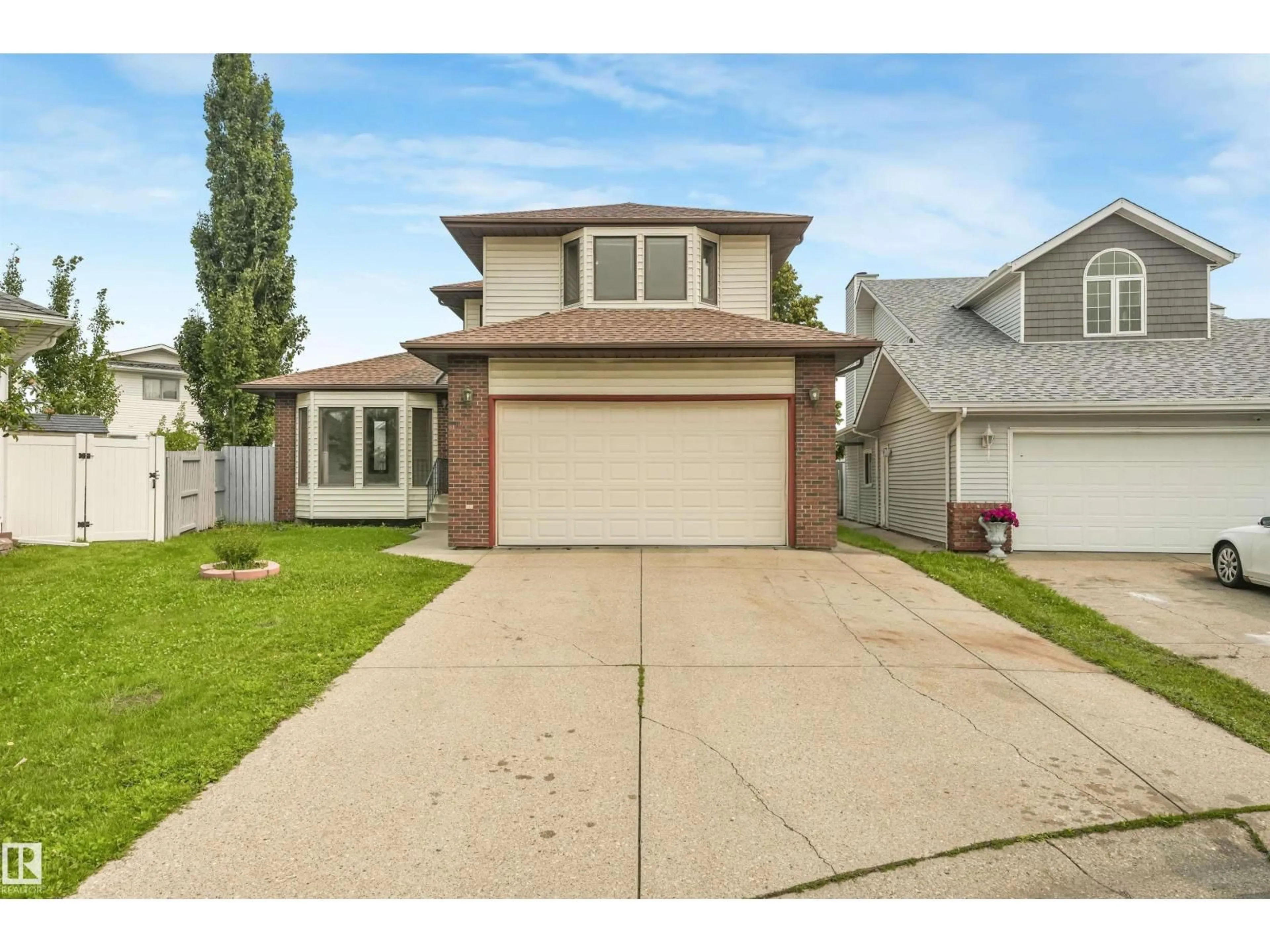 Home with vinyl exterior material, street for 8008 158 AV, Edmonton Alberta T5Z2T7