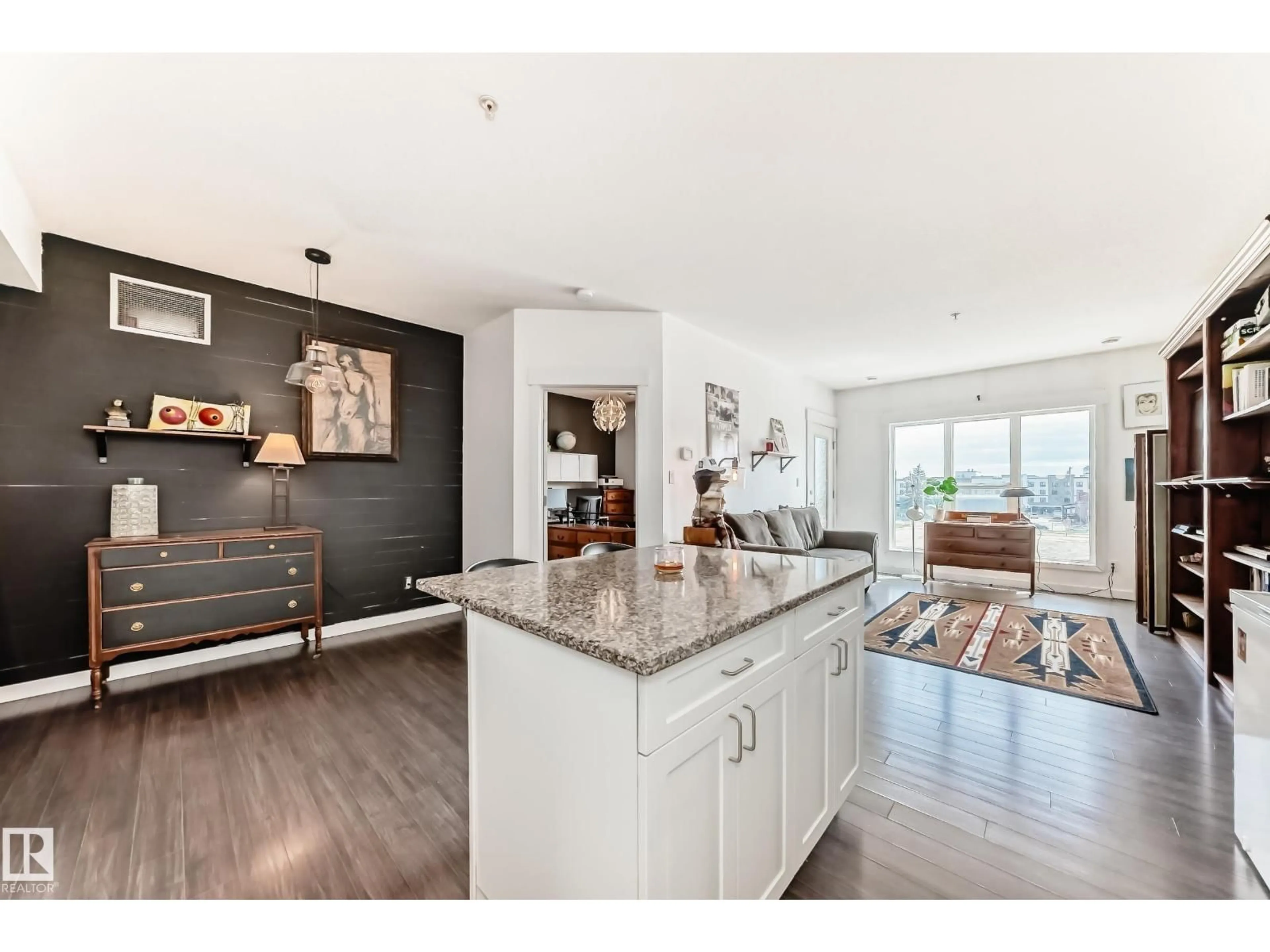 Open concept kitchen, wood/laminate floor for 316 10518 113 ST NW, Edmonton Alberta T5H0C6
