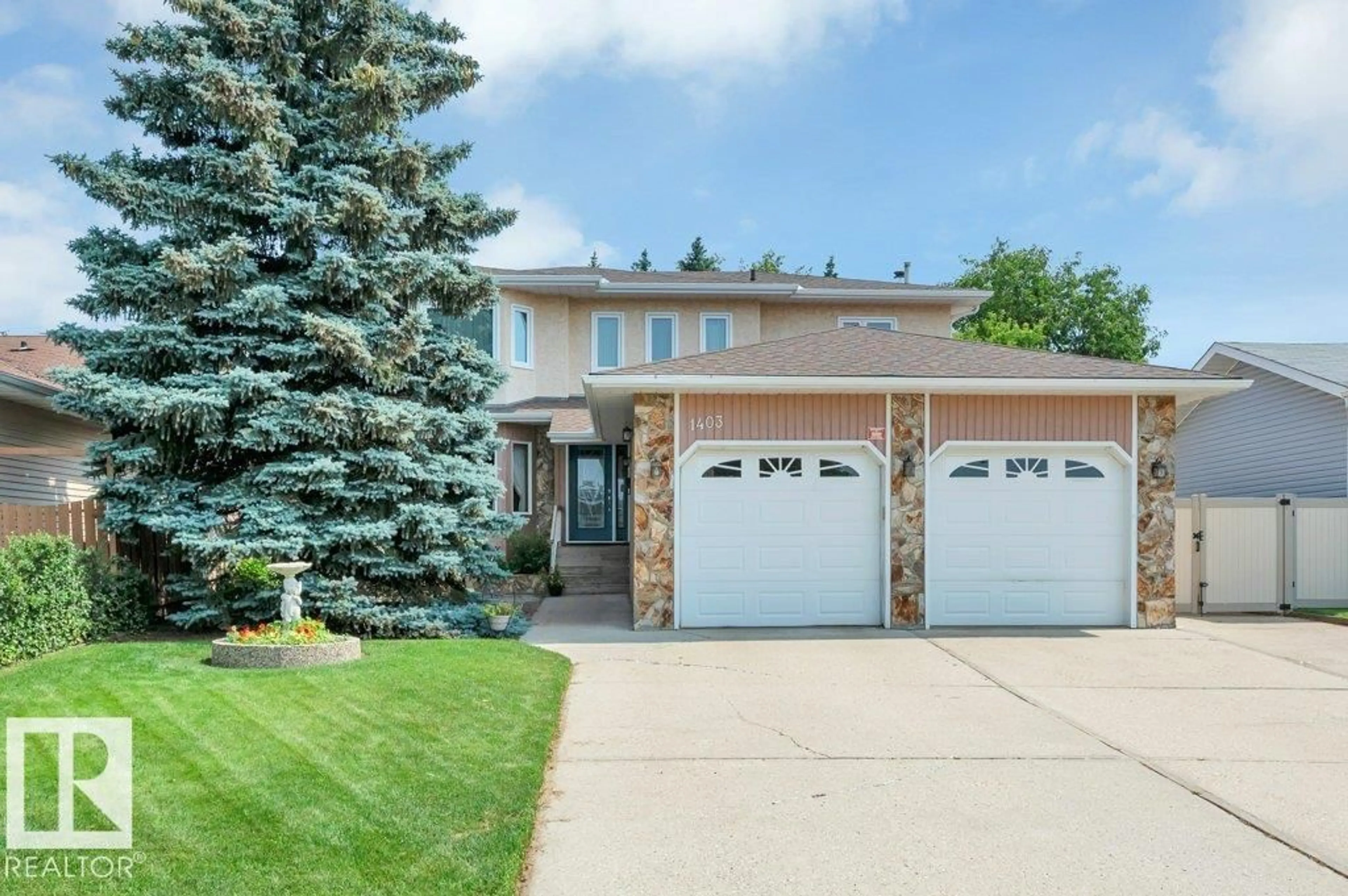Home with vinyl exterior material, street for NW - 1403 69 ST, Edmonton Alberta T6K3K5