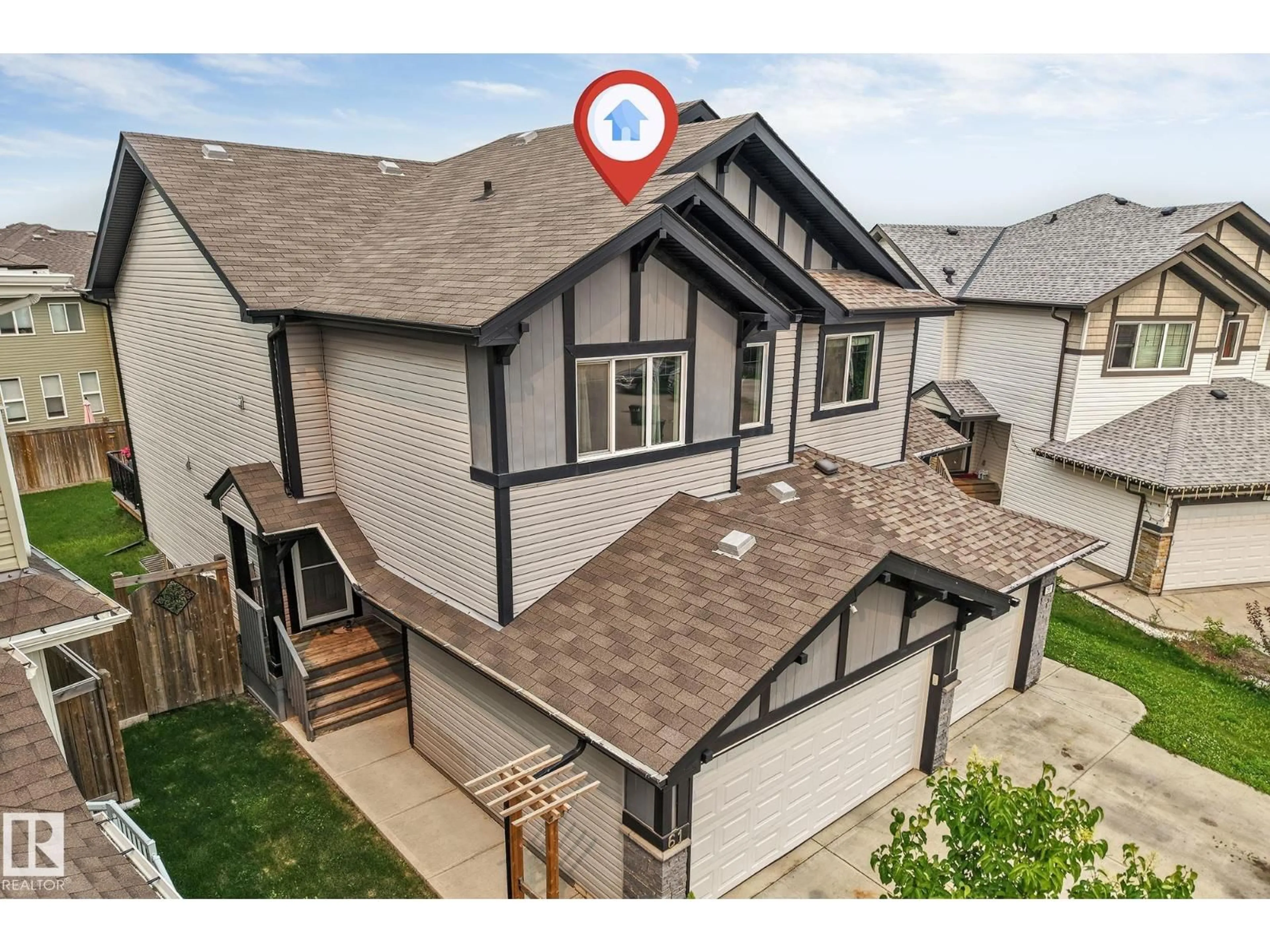 A pic from outside/outdoor area/front of a property/back of a property/a pic from drone, street for 61 SPRINGWOOD WY, Spruce Grove Alberta T7X0L4