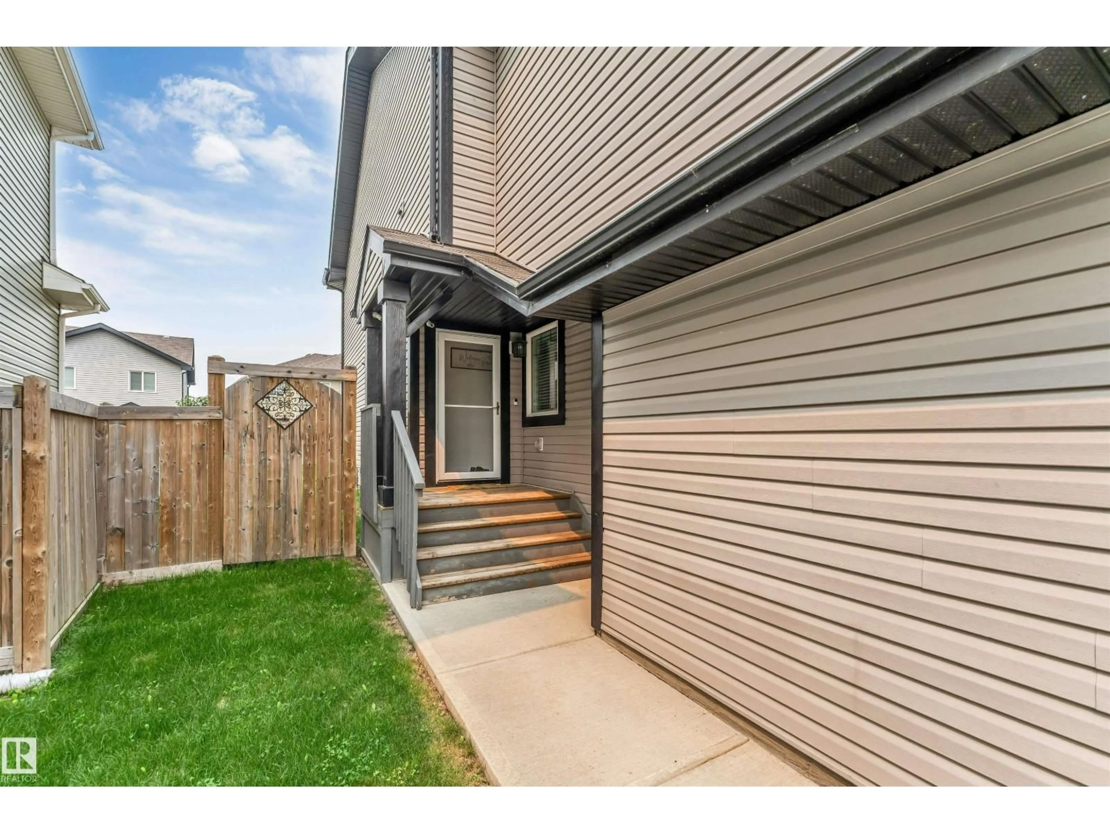 Home with vinyl exterior material, street for 61 SPRINGWOOD WY, Spruce Grove Alberta T7X0L4
