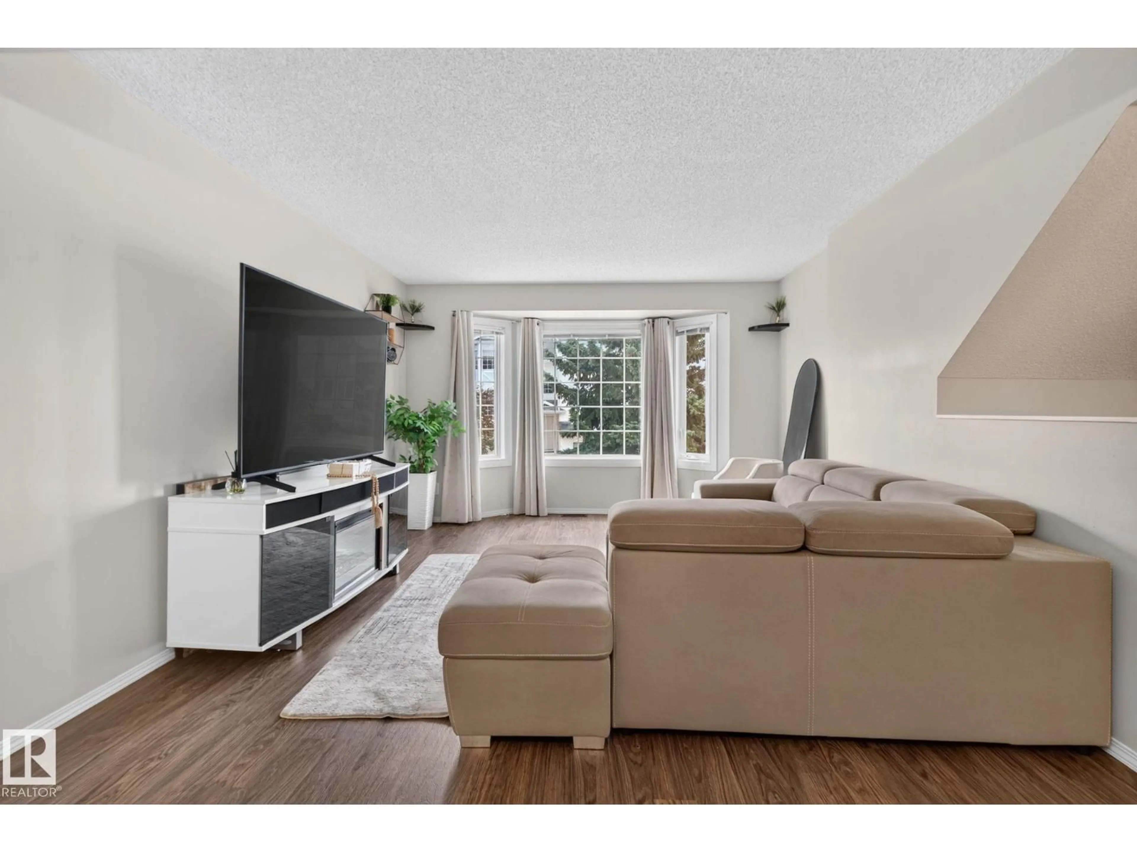 Living room with furniture, unknown for 15174 22 ST, Edmonton Alberta T5Y2T2