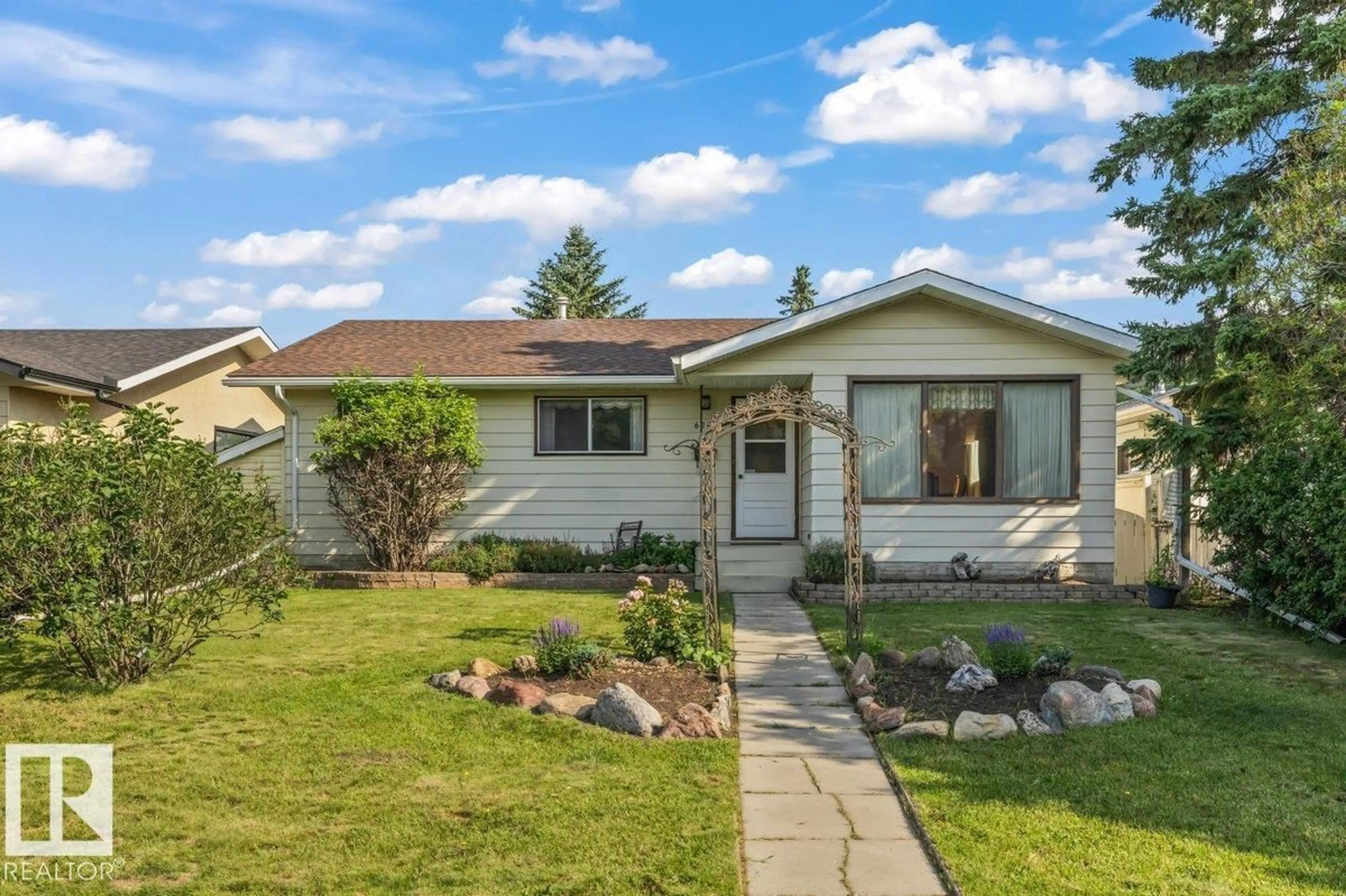 Home with vinyl exterior material, street for 6708 31 AV NW, Edmonton Alberta T6K1M3