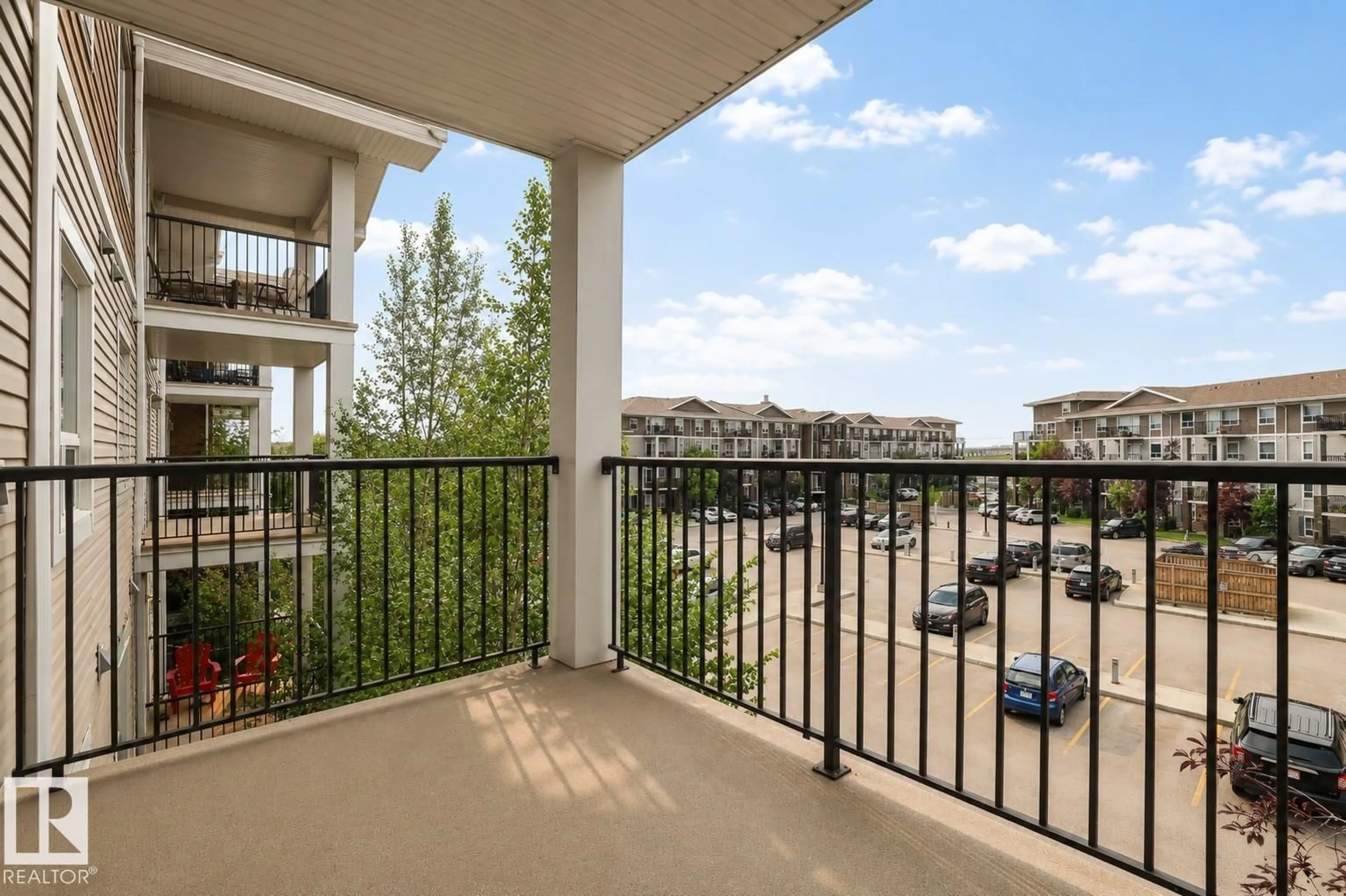 Balcony in the apartment, city buildings view from balcony for #3303 - 9351 SIMPSON DR, Edmonton Alberta T6R0N4