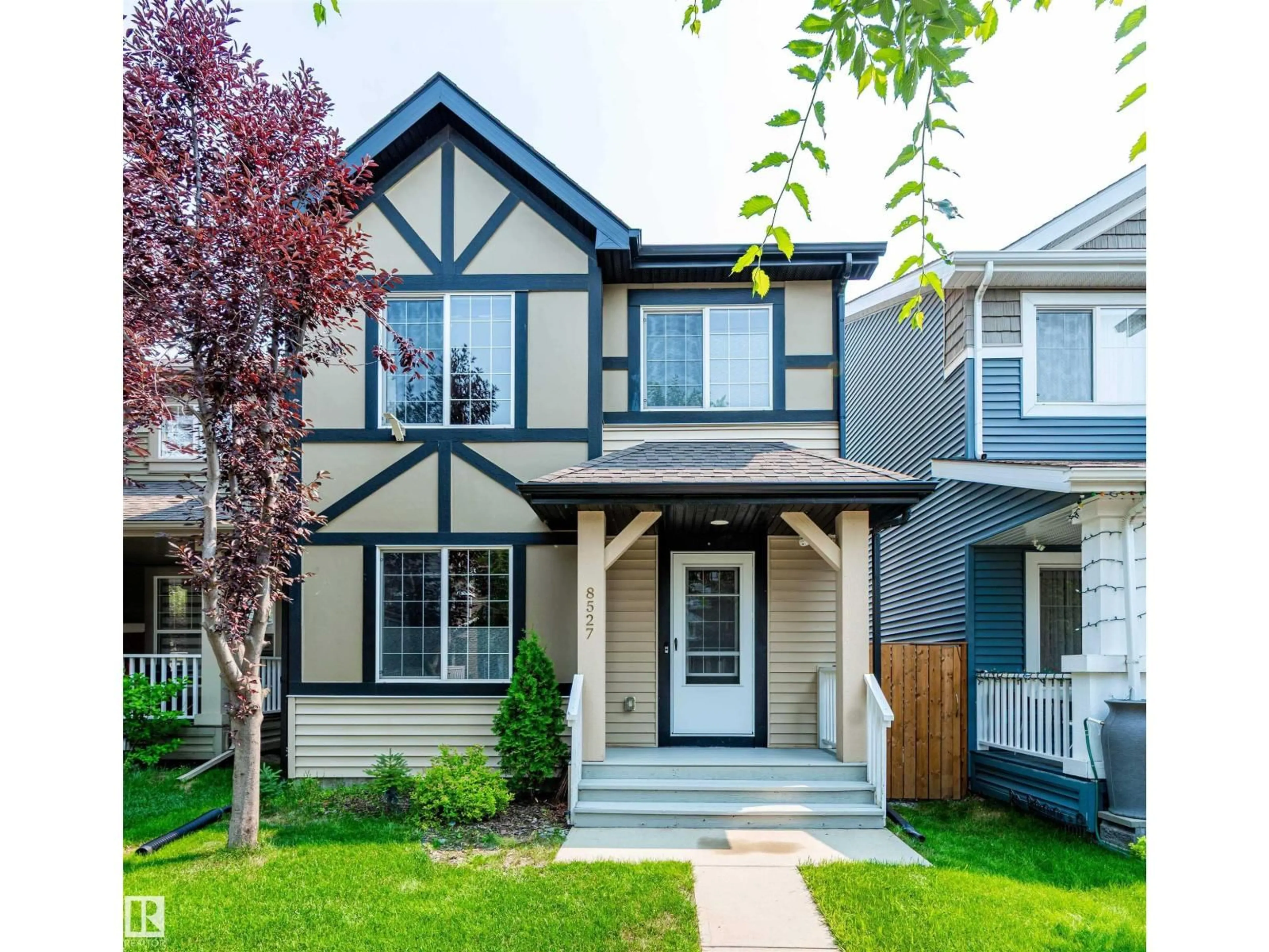 Home with vinyl exterior material, street for NW - 8527 ELLIS LINK LI, Edmonton Alberta T6M0P5