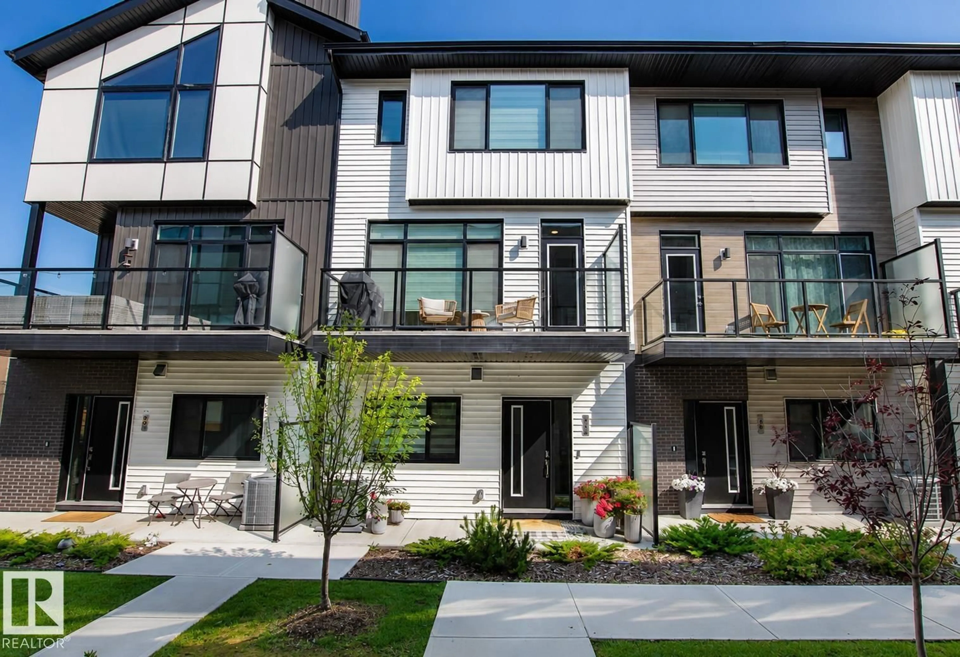 Home with vinyl exterior material, street for 50 - 82 EBONY BV, Sherwood Park Alberta T8H2X4