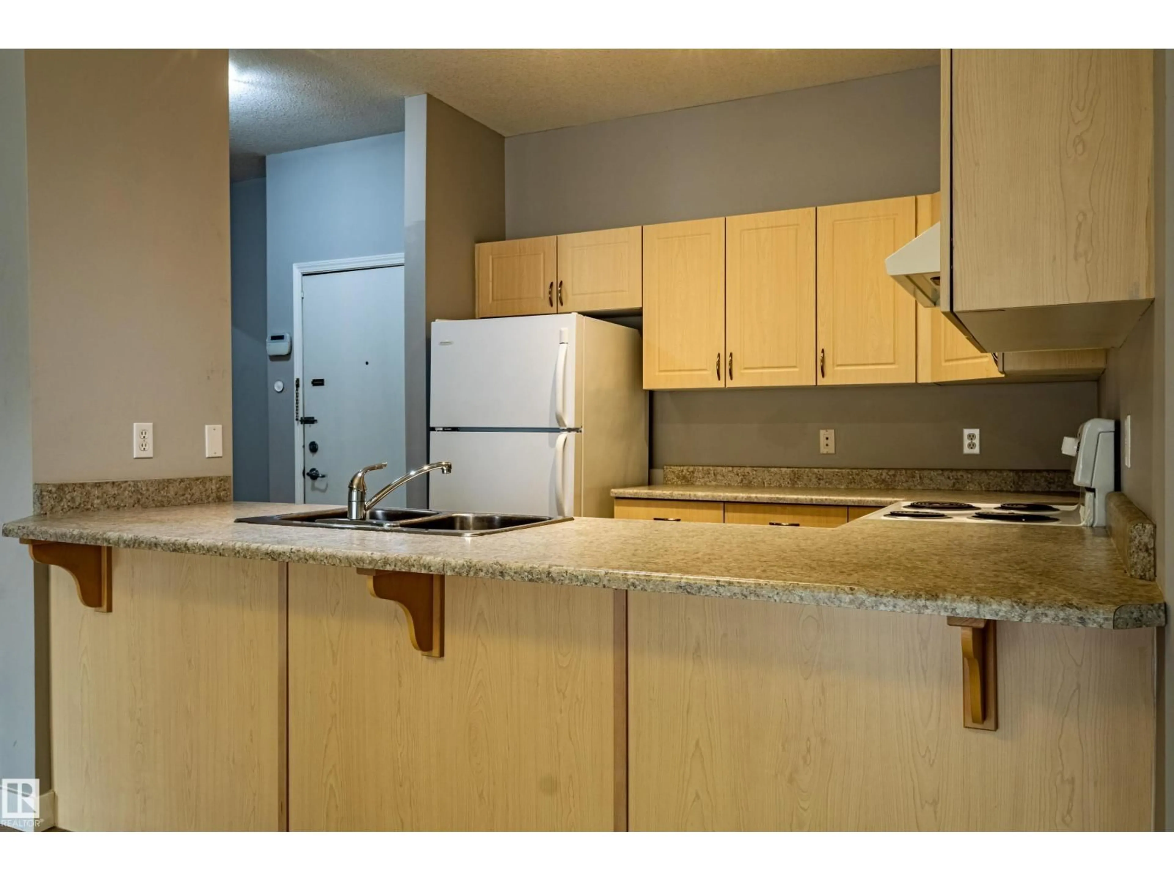 Standard kitchen, unknown for #412 - 4304 139 AV, Edmonton Alberta T5Y0H6