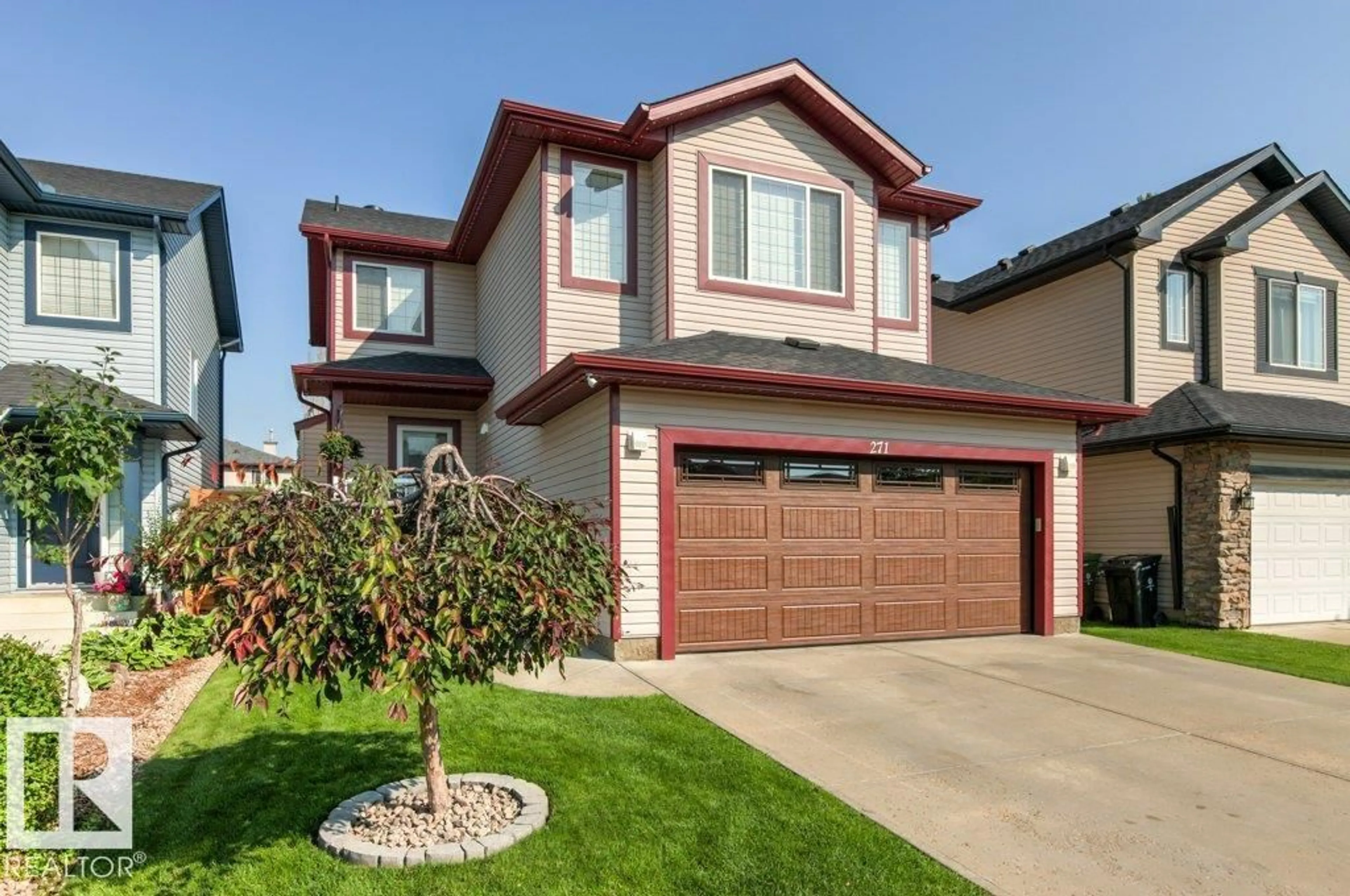 Home with vinyl exterior material, street for 271 WESTWOOD PT, Fort Saskatchewan Alberta T8L4N5