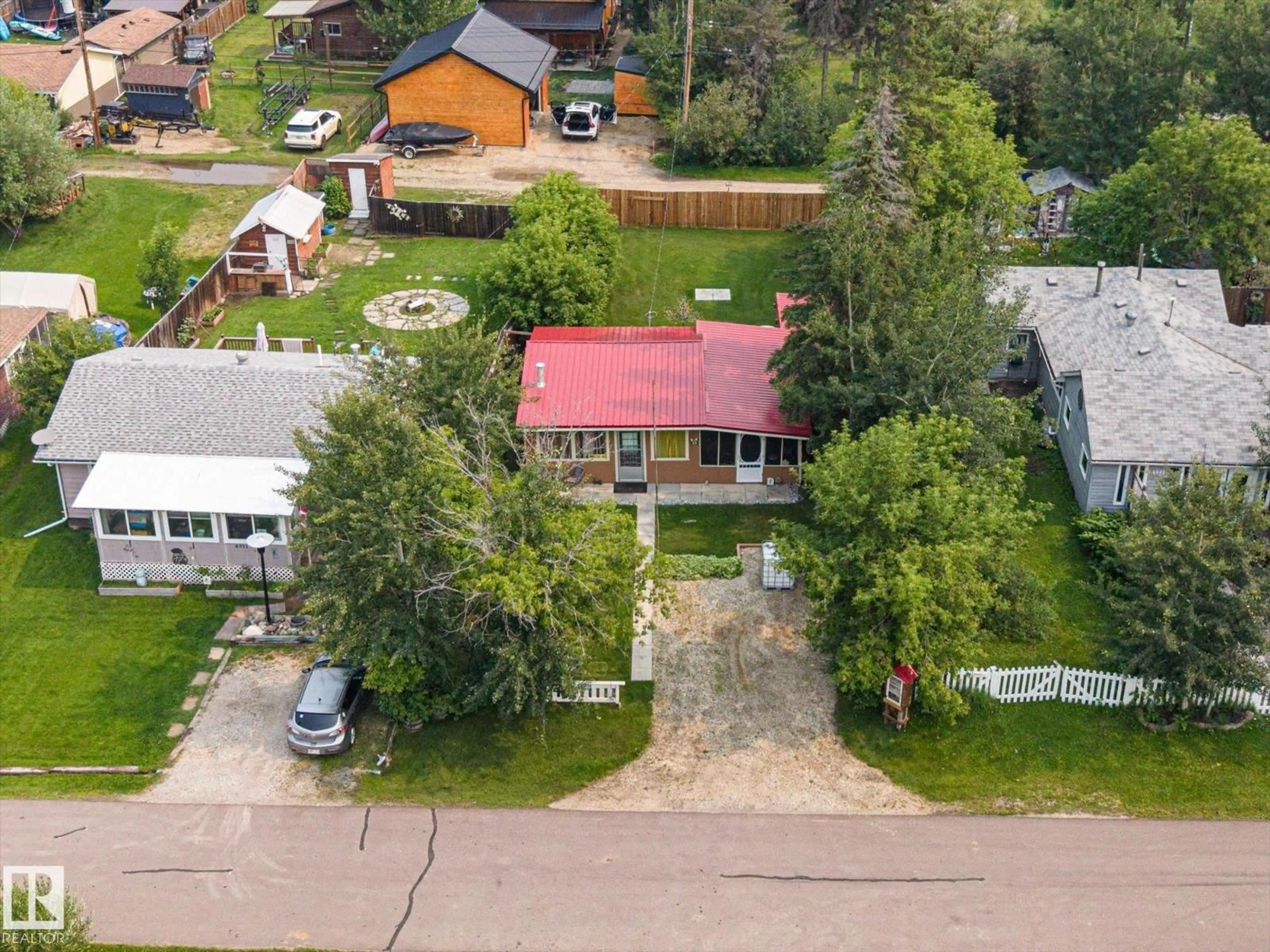 A pic from outside/outdoor area/front of a property/back of a property/a pic from drone, street for 4907 54 ST, Rural Lac Ste. Anne County Alberta T0E0A0