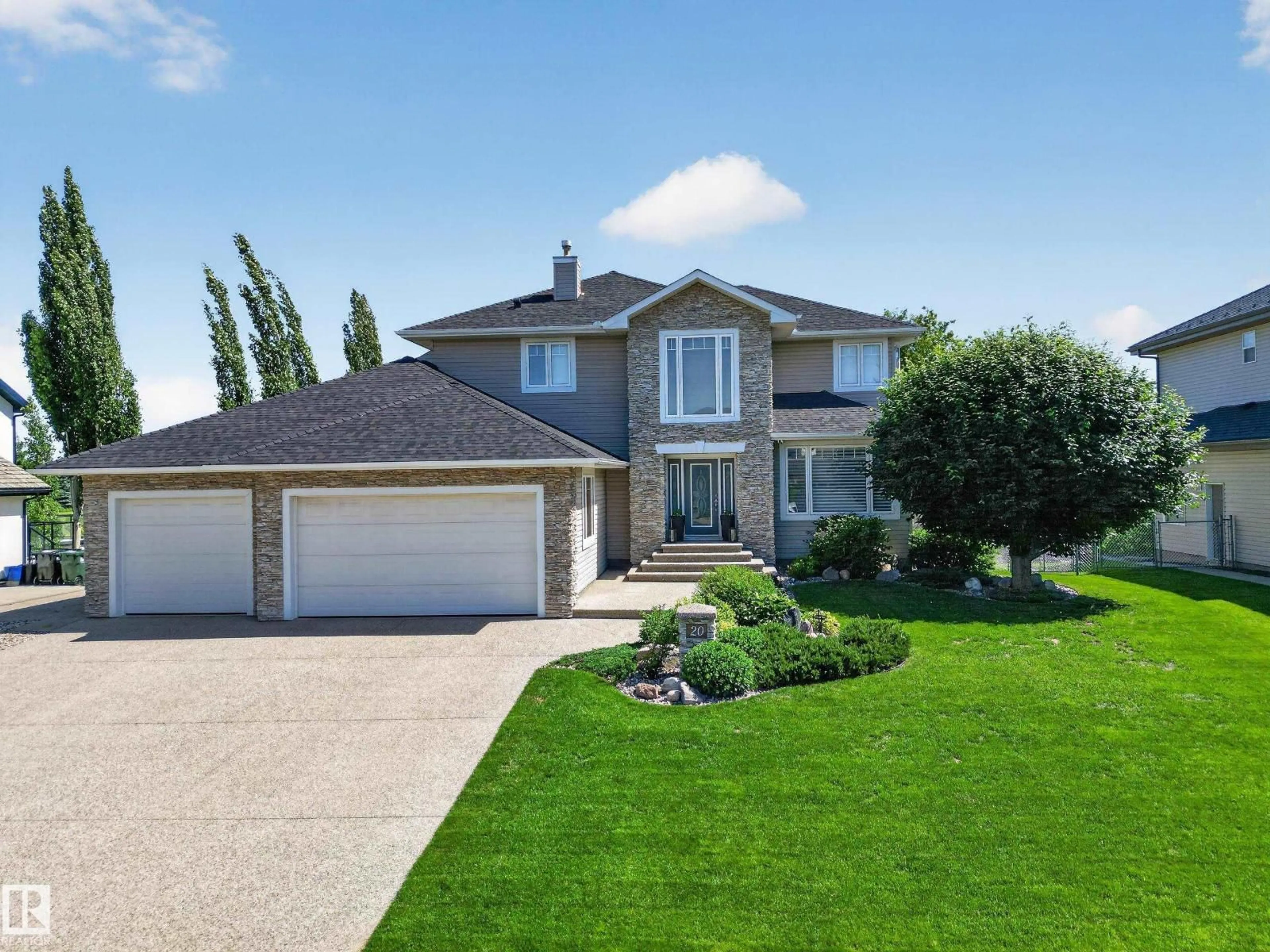 Home with vinyl exterior material, street for 52304 - 20 RGE ROAD 233 RGE ROAD, Rural Strathcona County Alberta T8B0C9