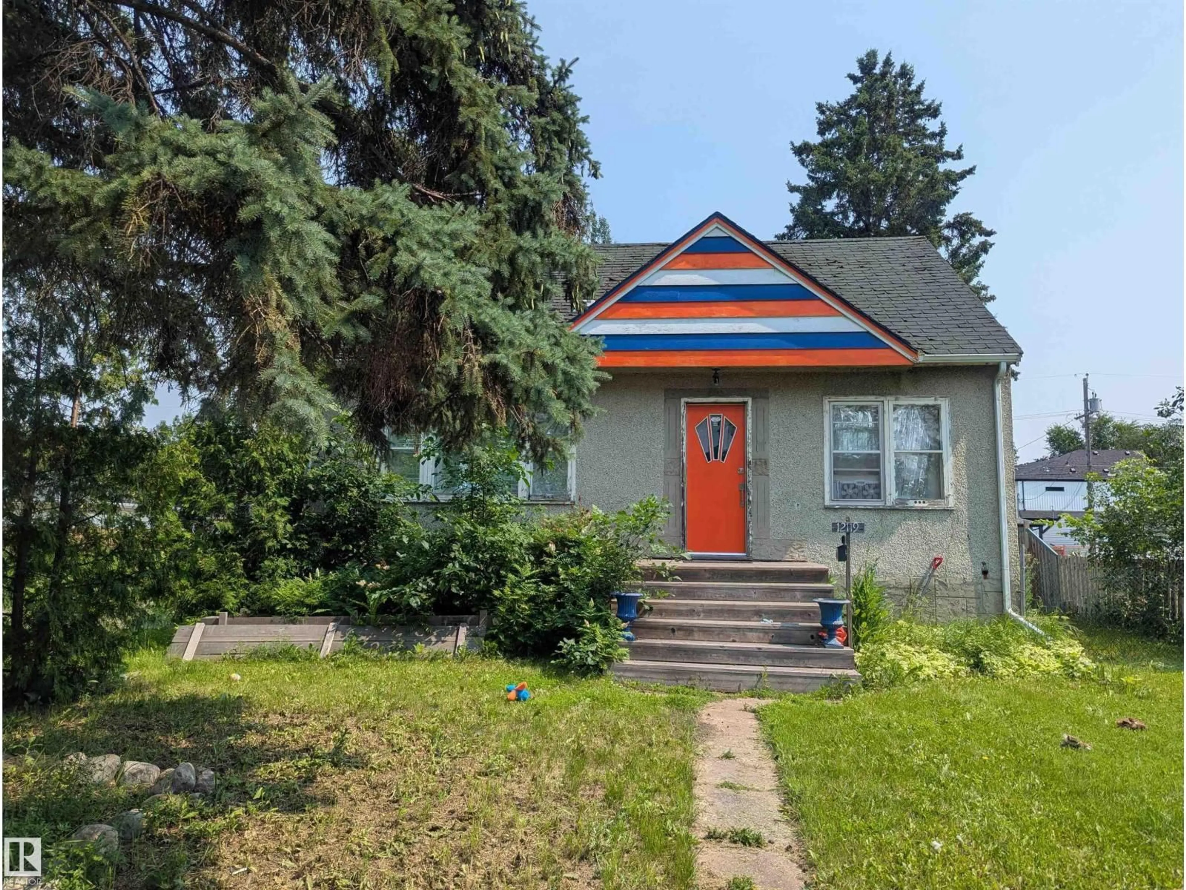 Home with vinyl exterior material, street for NW - 12119 123 ST, Edmonton Alberta T5L0H4