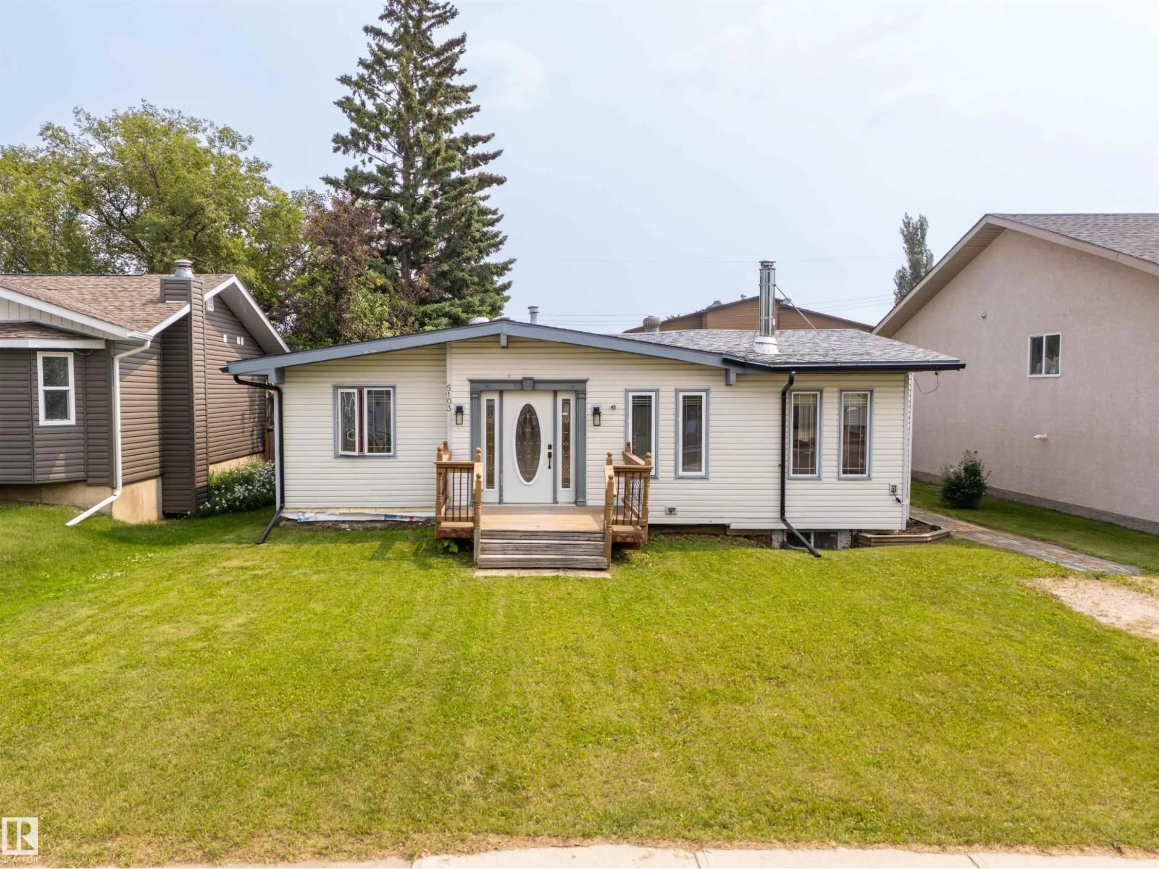 Home with vinyl exterior material, street for 5103 50 ST, Cold Lake Alberta T9M1X2
