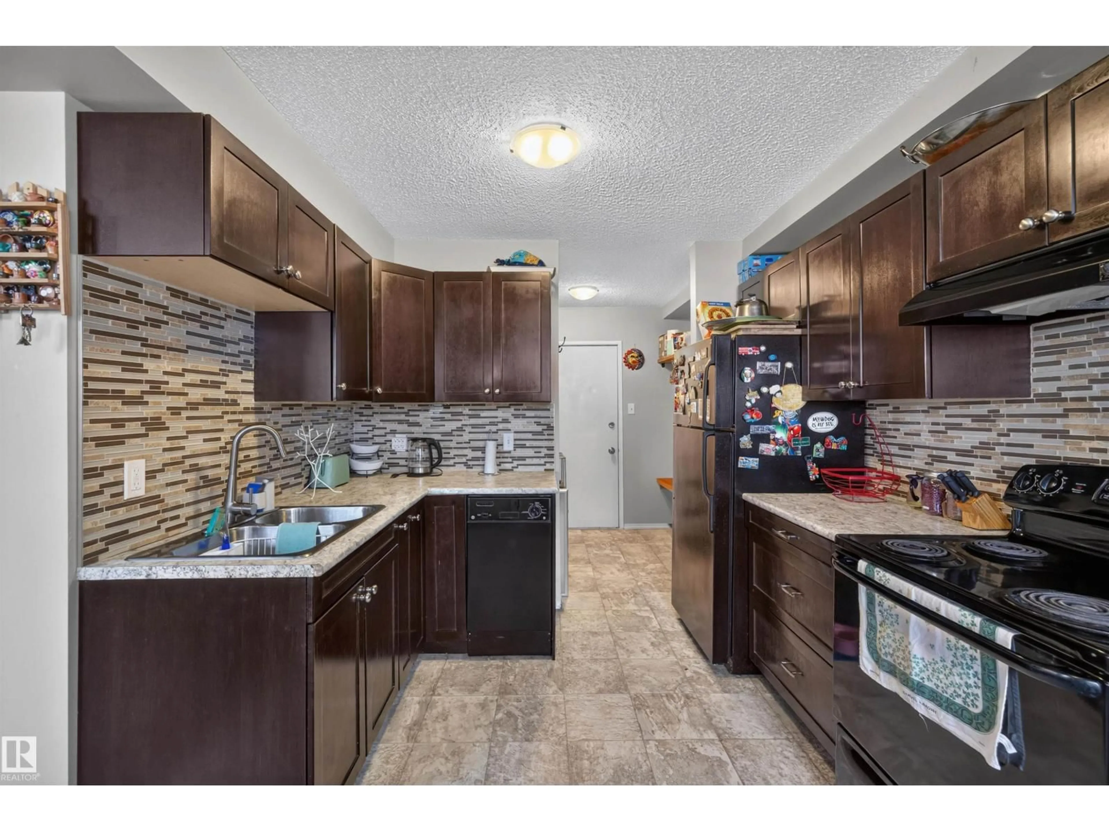 Standard kitchen, ceramic/tile floor for #102 - 14520 52 ST, Edmonton Alberta T5A3K5