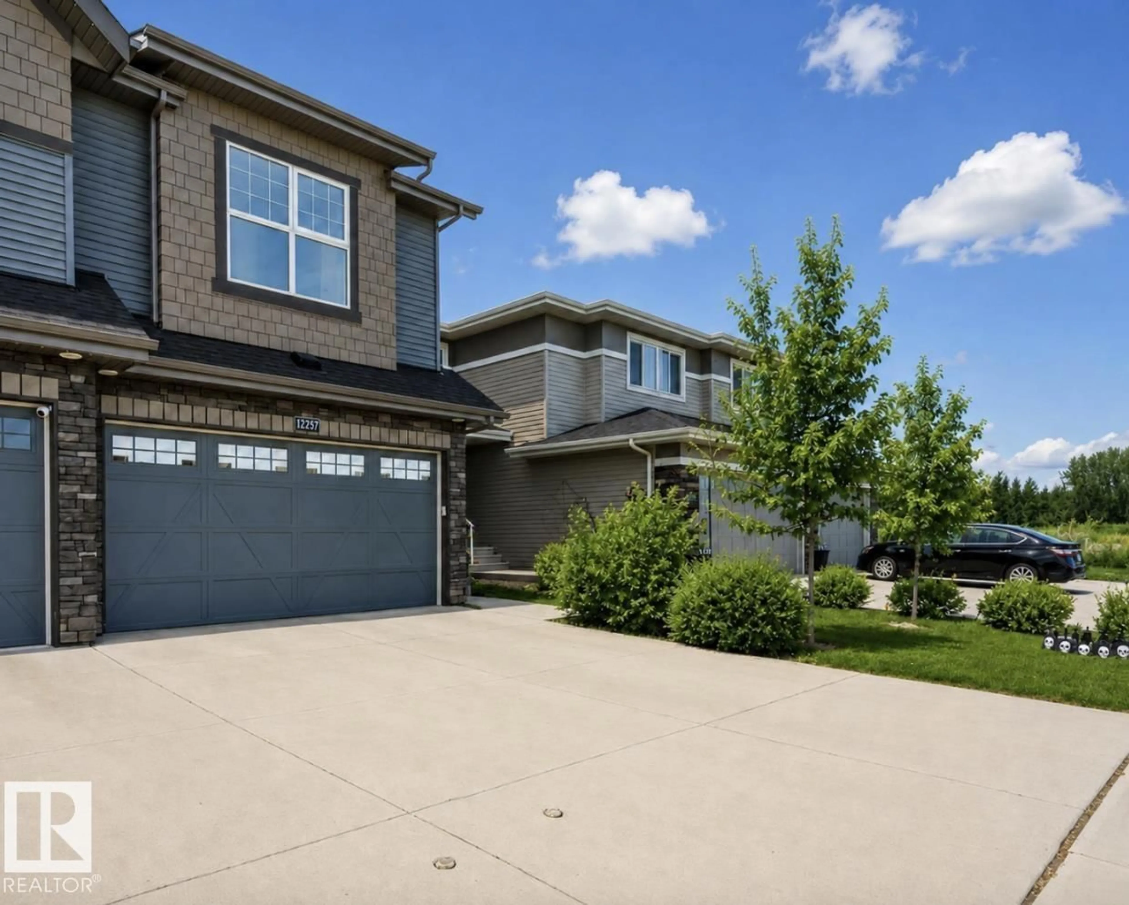 Home with vinyl exterior material, street for NW - 12737 205 ST, Edmonton Alberta T5S0L8