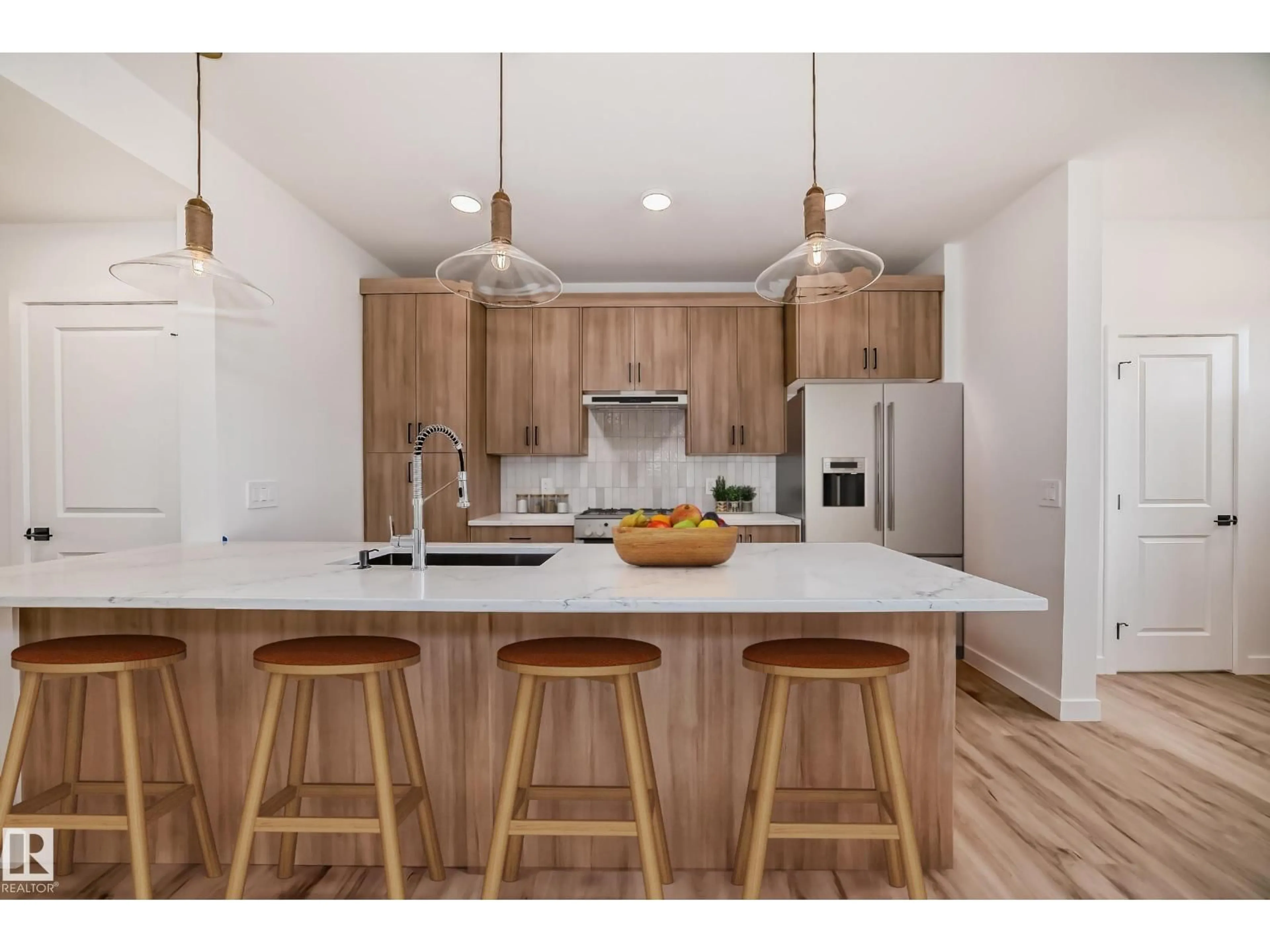 Open concept kitchen, wood/laminate floor for SW - 2624 62 ST, Edmonton Alberta T6X3G3
