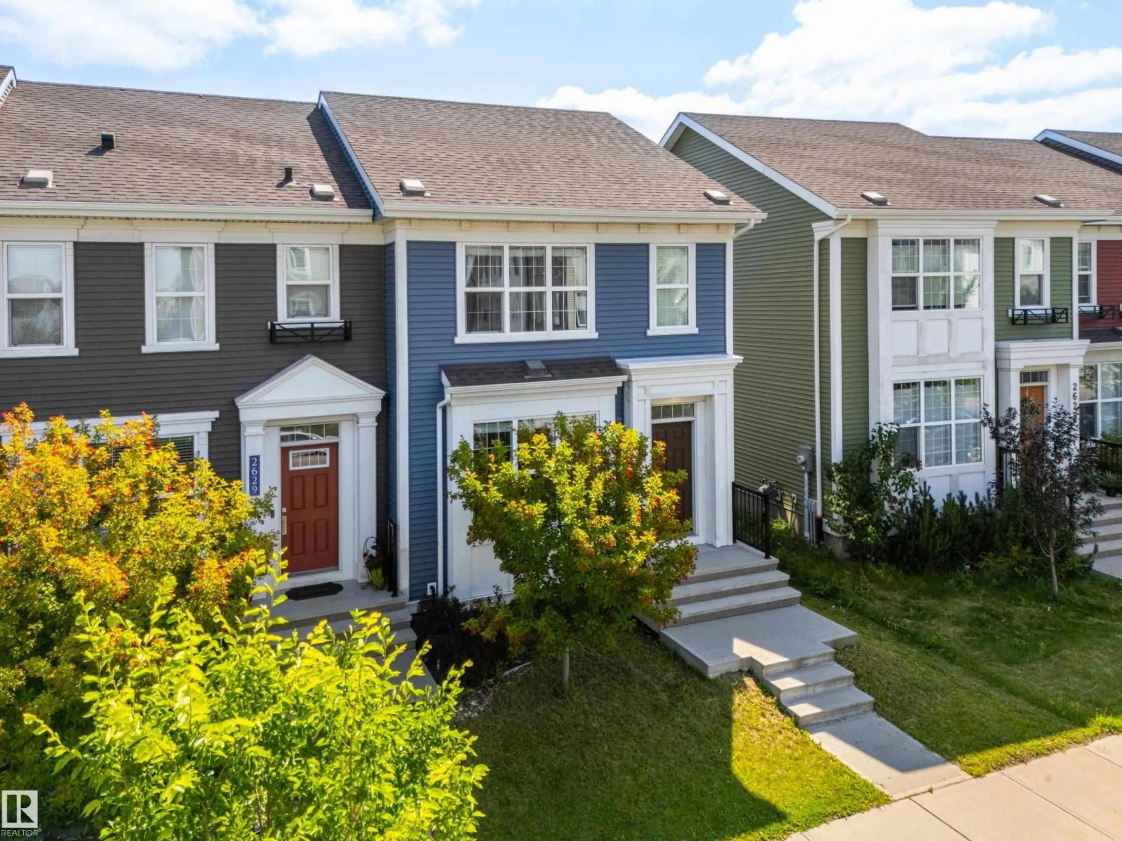 Home with vinyl exterior material, street for 2627 MAPLE WY, Edmonton Alberta T6T2E9