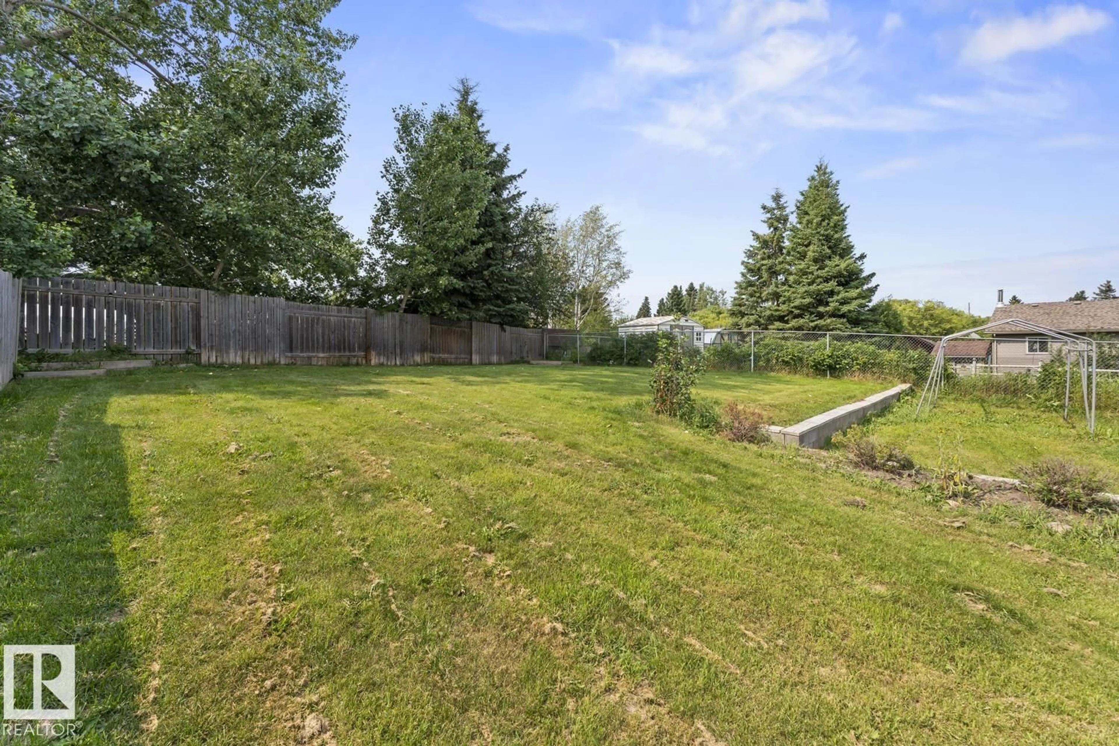 A pic from outside/outdoor area/front of a property/back of a property/a pic from drone, forest/trees view for 1801 FOREST DR, Cold Lake Alberta T9M1L7
