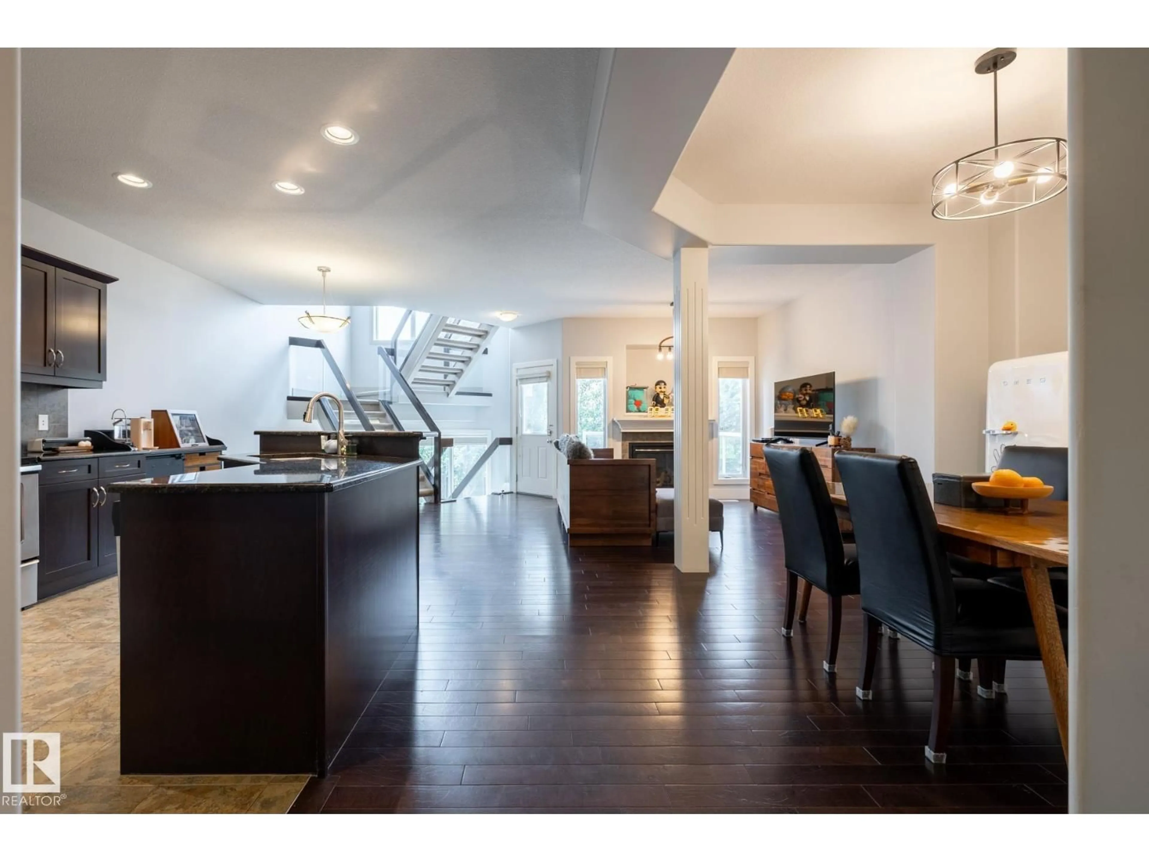 Open concept kitchen, wood/laminate floor for #10 - 1901 126 ST SW, Edmonton Alberta T6W0R9