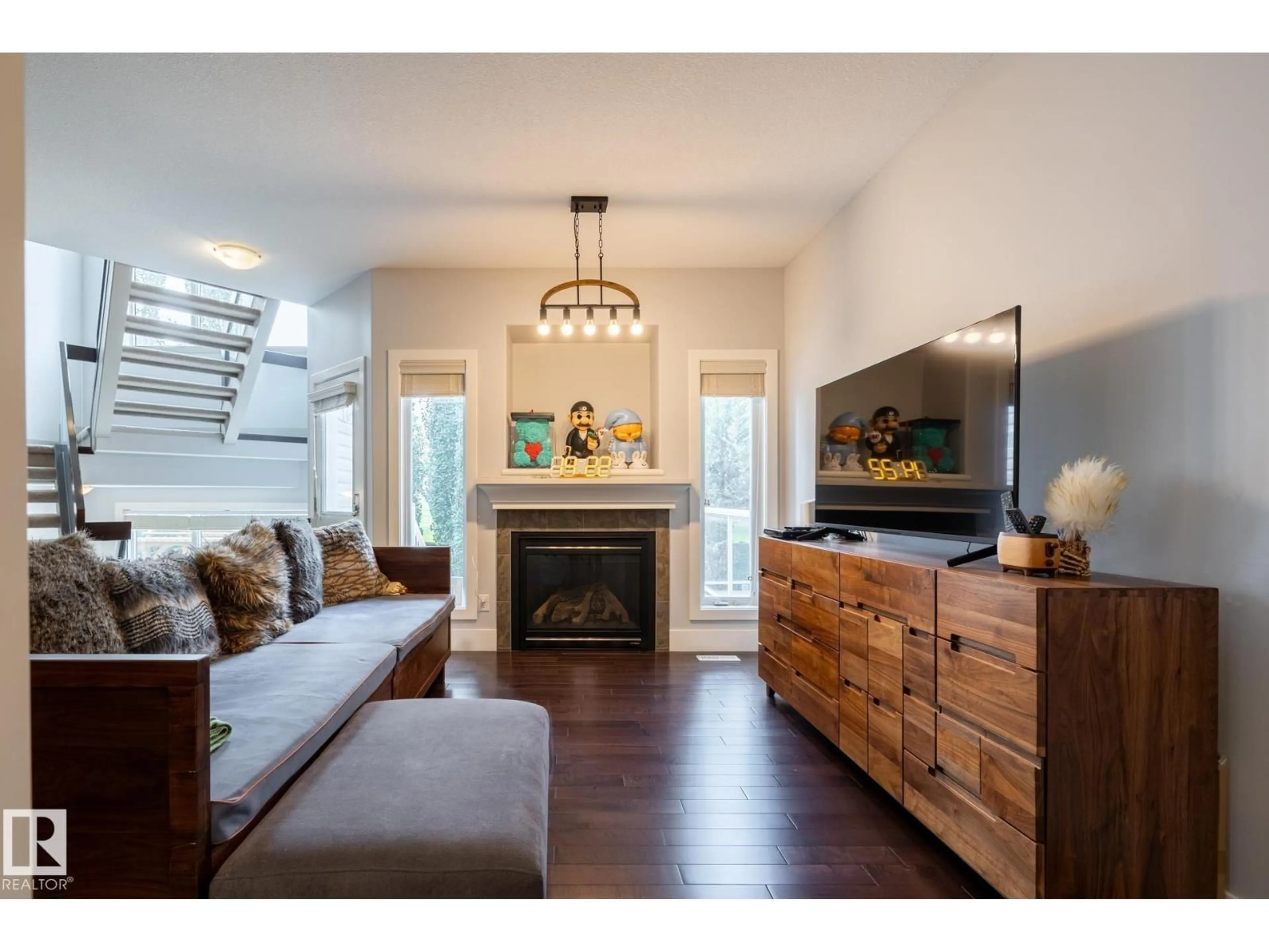 Living room with furniture, wood/laminate floor for #10 - 1901 126 ST SW, Edmonton Alberta T6W0R9