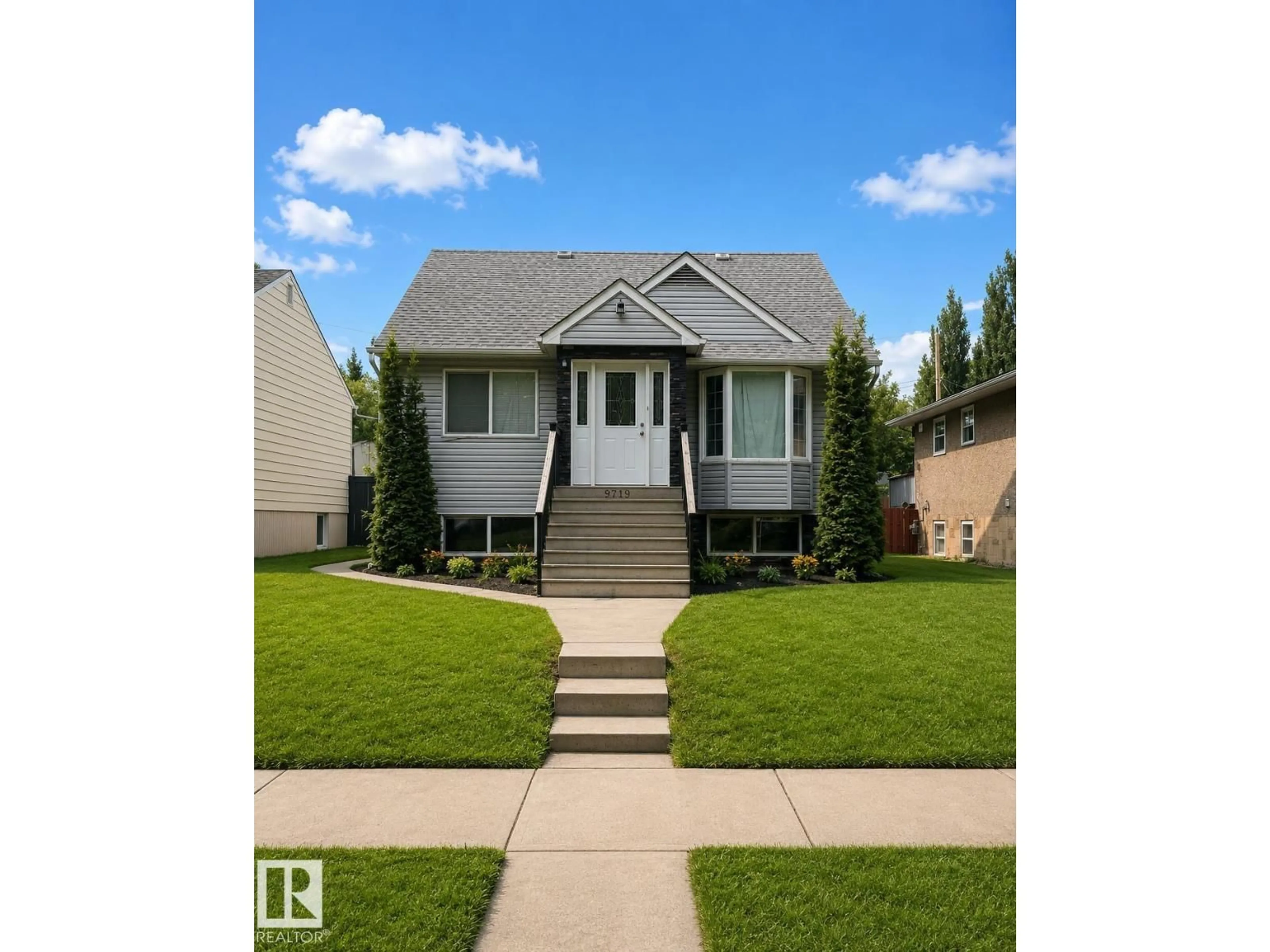 Home with vinyl exterior material, street for 9719 71 AV, Edmonton Alberta T6E0W5