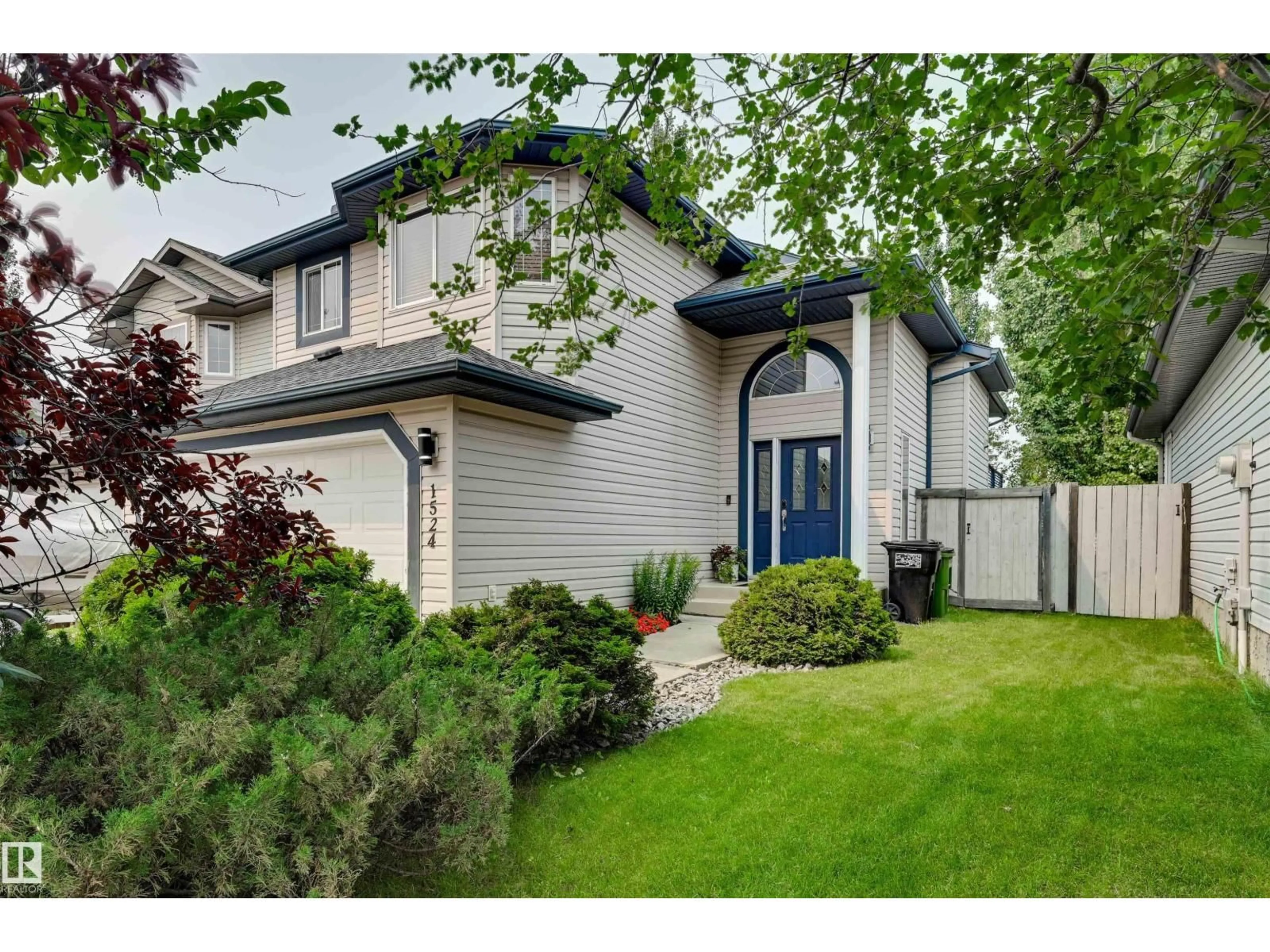 Home with vinyl exterior material, street for 1524 BRECKENRIDGE CL, Edmonton Alberta T5T6R7