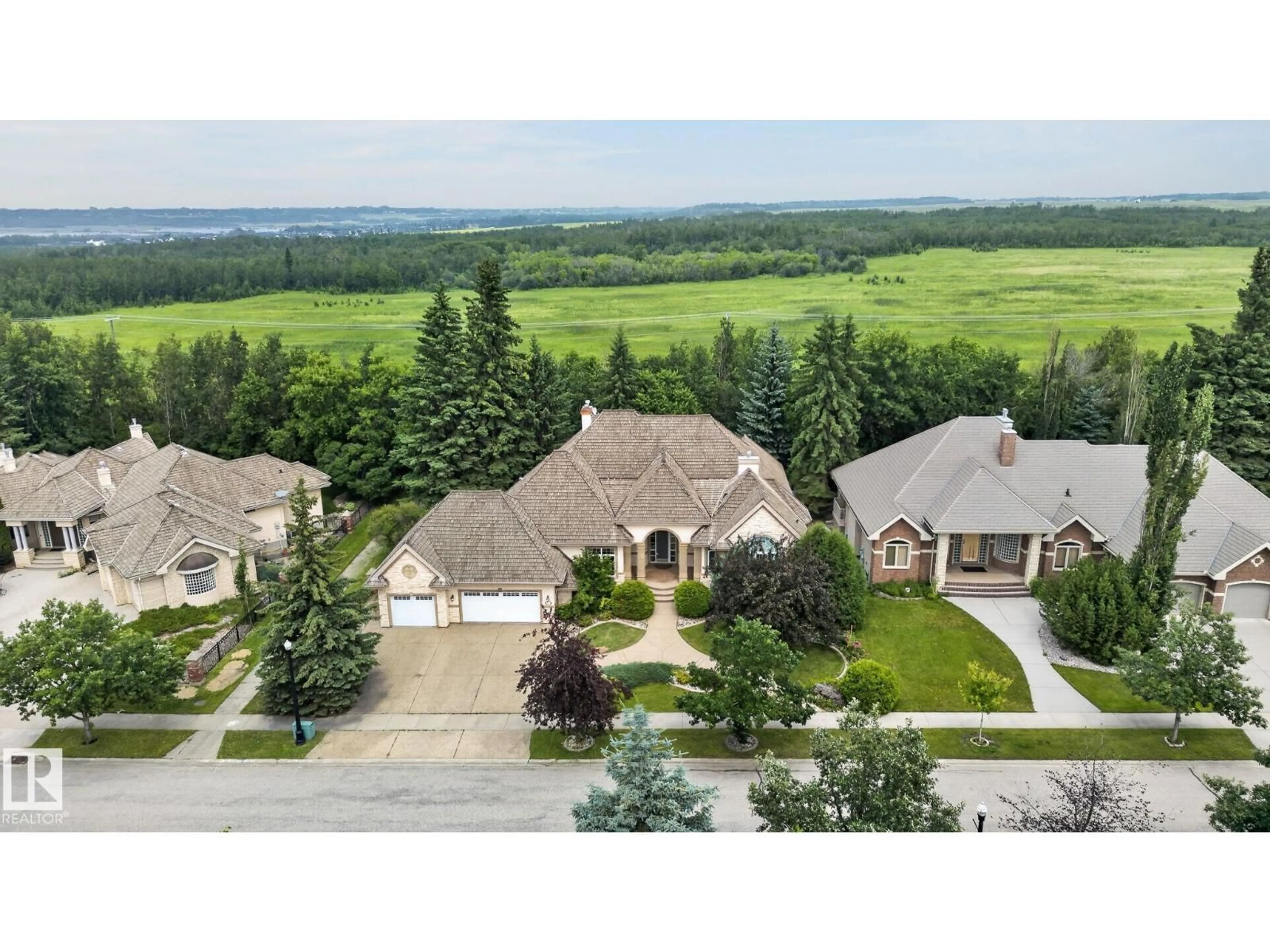 A pic from outside/outdoor area/front of a property/back of a property/a pic from drone, mountain view for 60 KINGSBURY CR, St. Albert Alberta T8N6W6