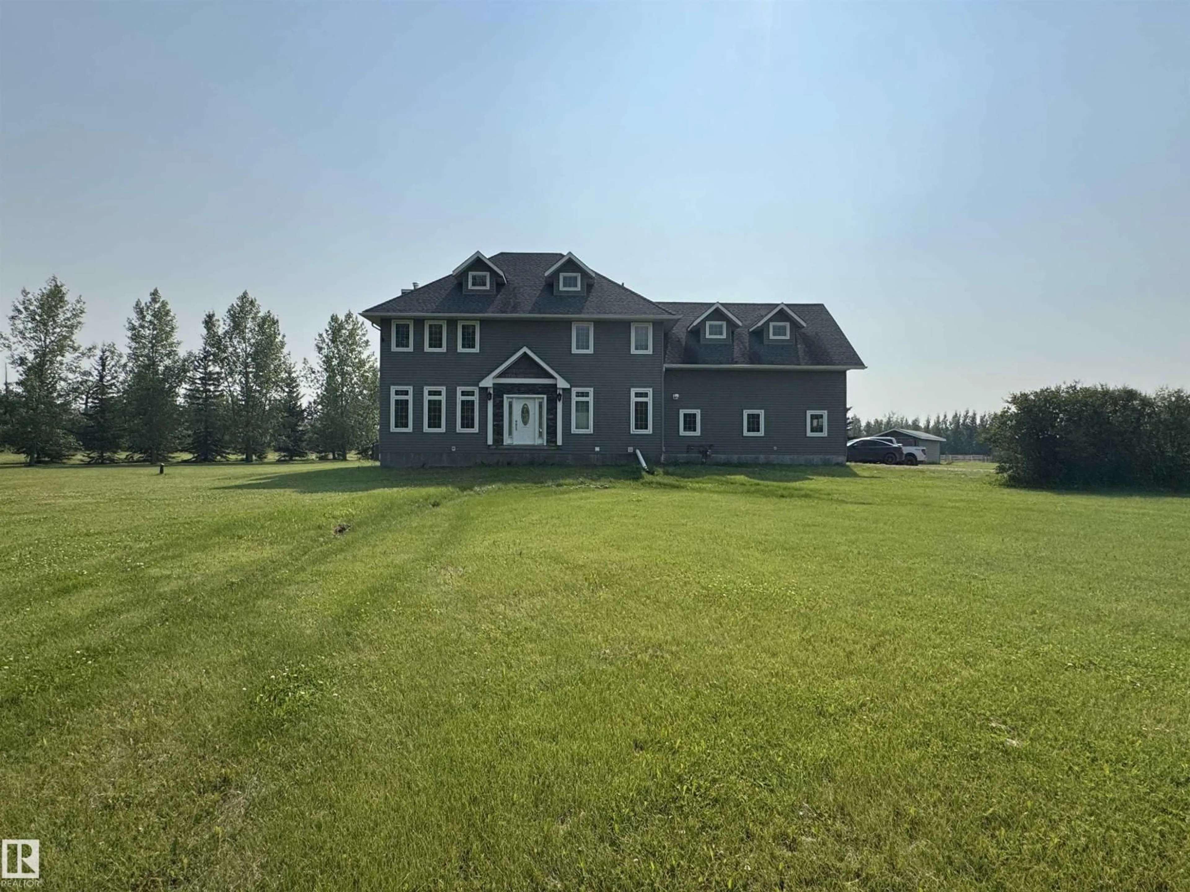 A pic from outside/outdoor area/front of a property/back of a property/a pic from drone, unknown for 60120 RGE ROAD 265, Rural Westlock County Alberta T7P2P5