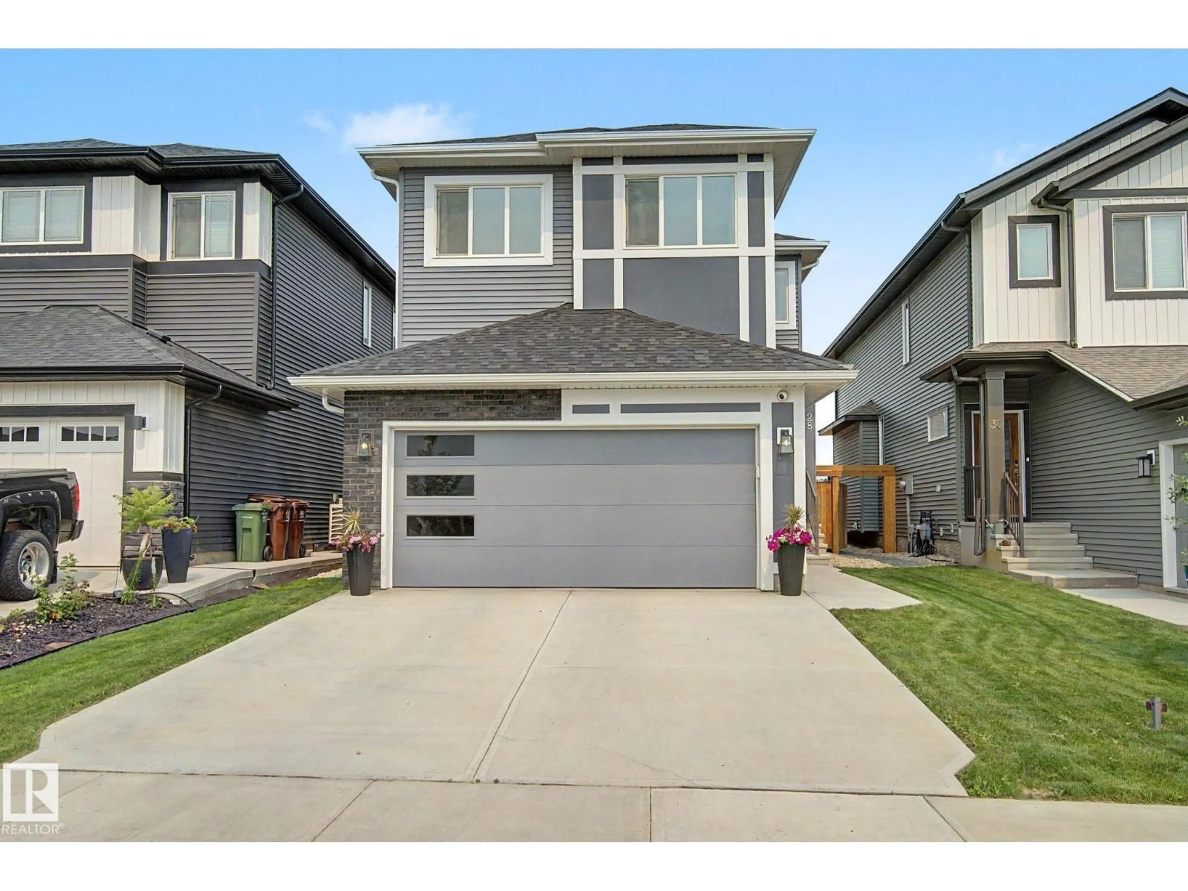 Home with vinyl exterior material, street for 28 ROSEWOOD WY, St. Albert Alberta T8N7Y8