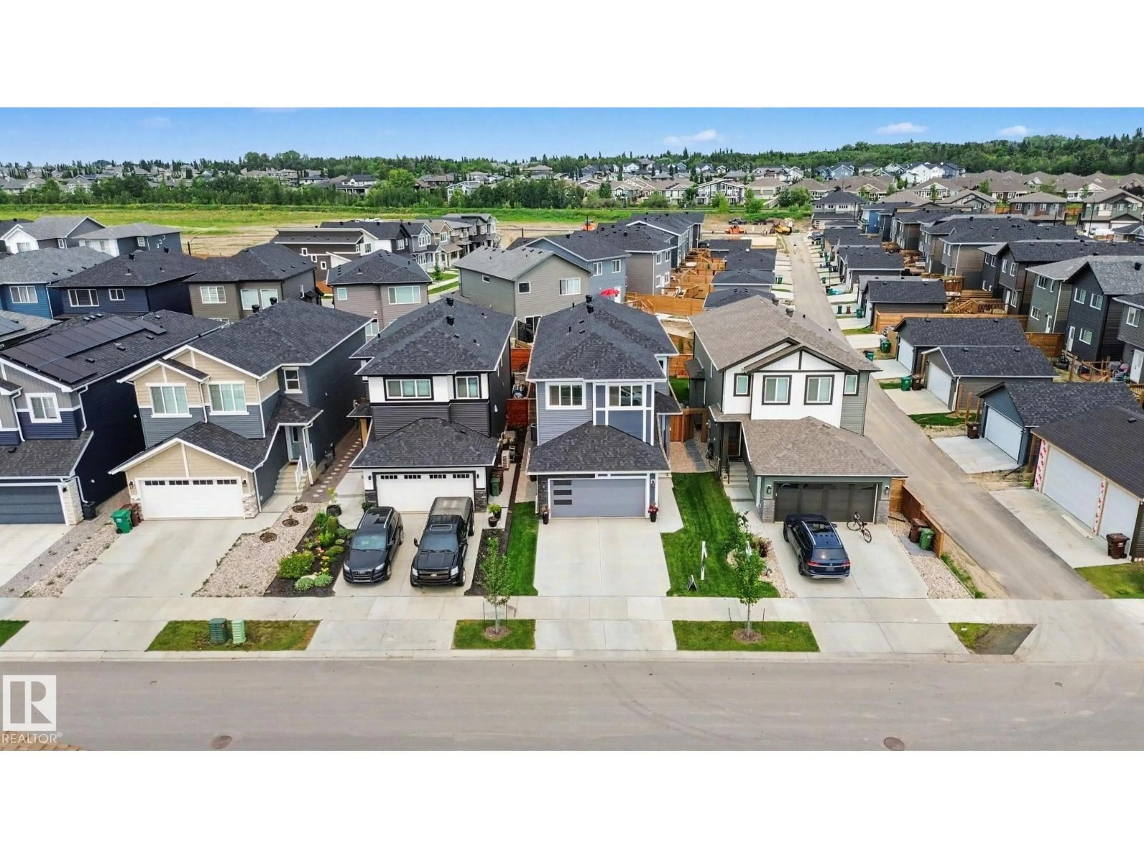 A pic from outside/outdoor area/front of a property/back of a property/a pic from drone, street for 28 ROSEWOOD WY, St. Albert Alberta T8N7Y8