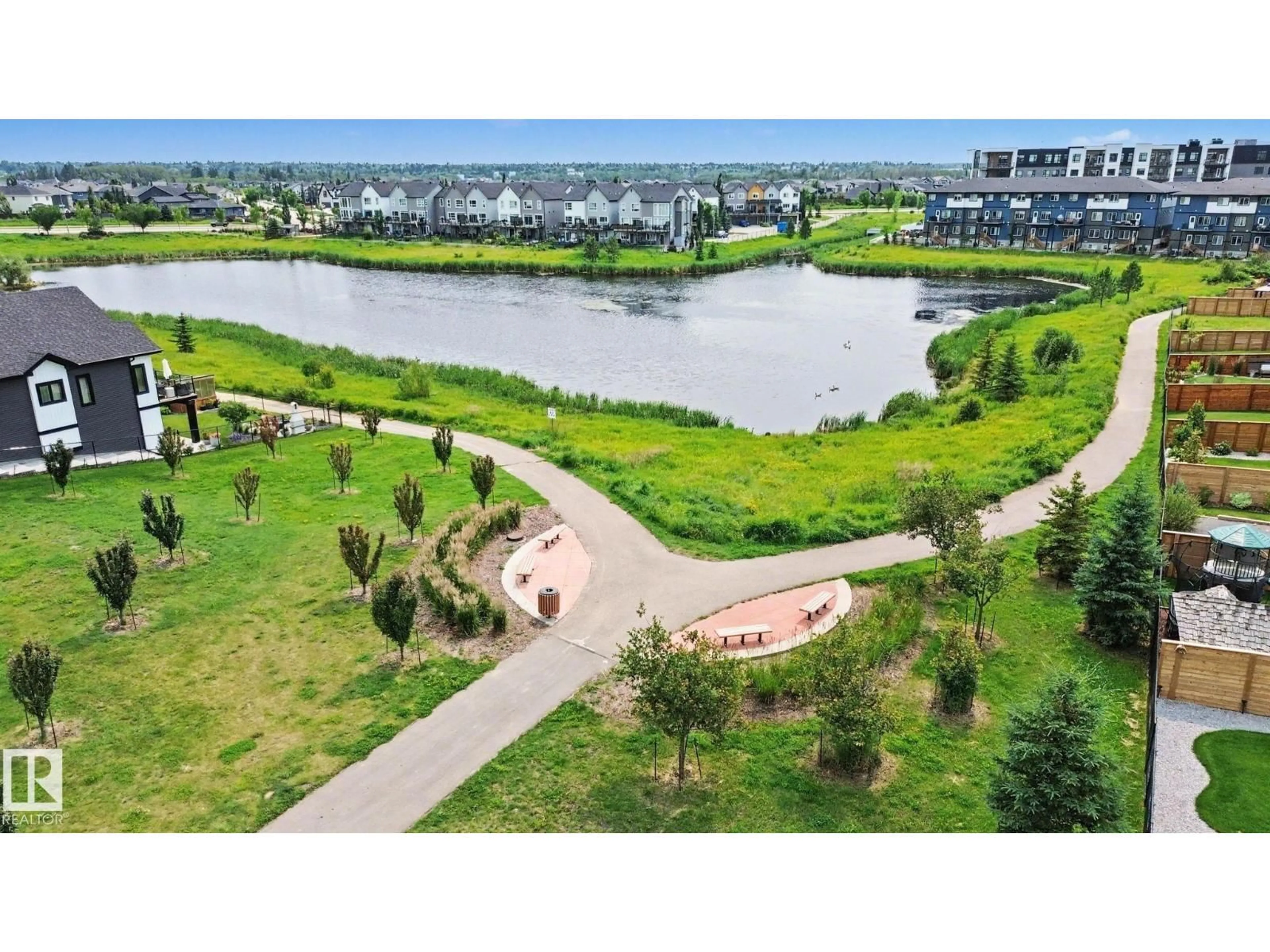 A pic from outside/outdoor area/front of a property/back of a property/a pic from drone, water/lake/river/ocean view for 28 ROSEWOOD WY, St. Albert Alberta T8N7Y8